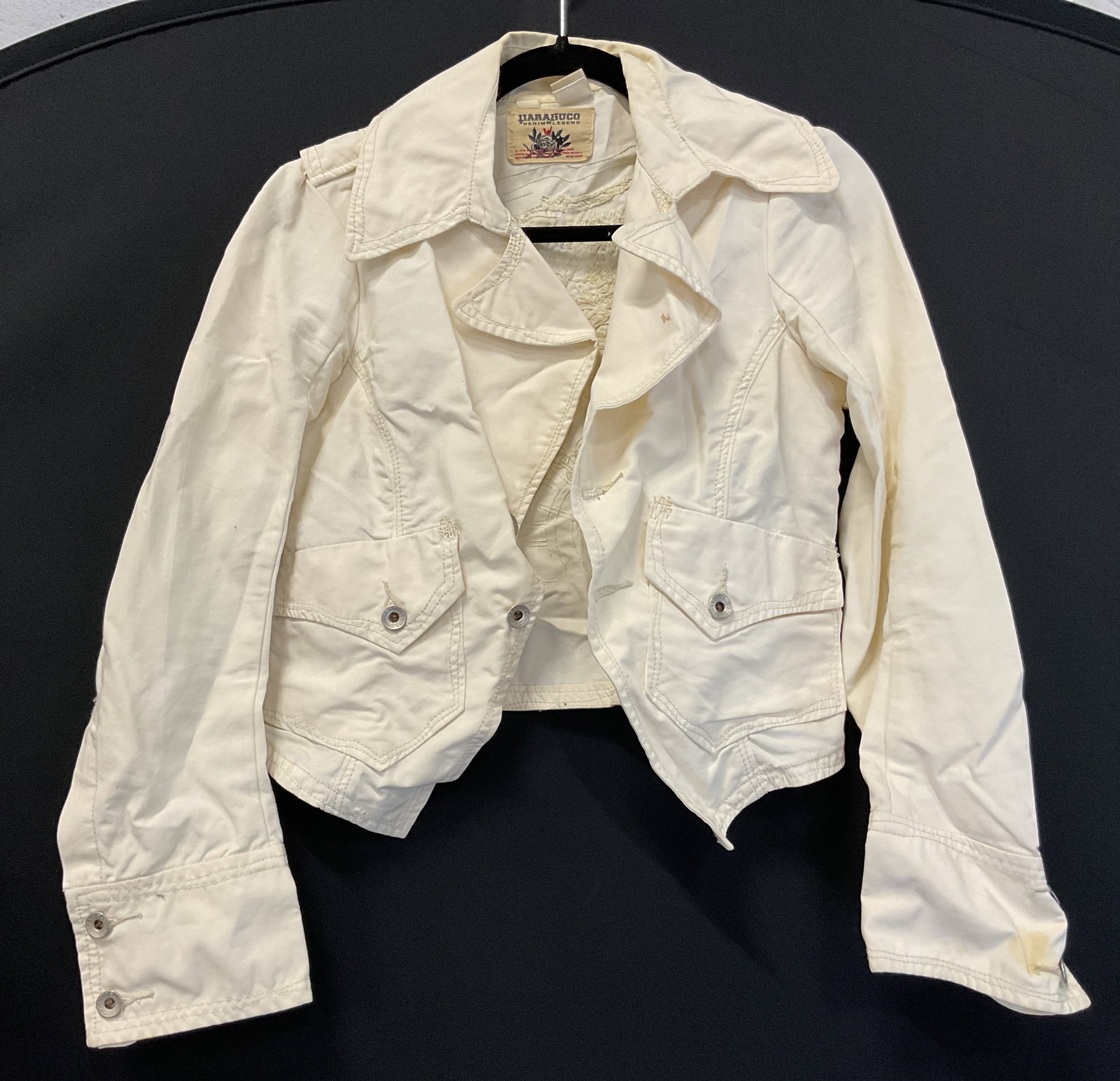 Parasuco White Embroidered Denim Jacket: Parasuco white embroidered denim jacket. 100% cotton. Size S. Collared, buttoned, front pockets. Embroidered design on backside. Some blemishes. Denim jacket, jacket, Parasuco, wearables, clothing,