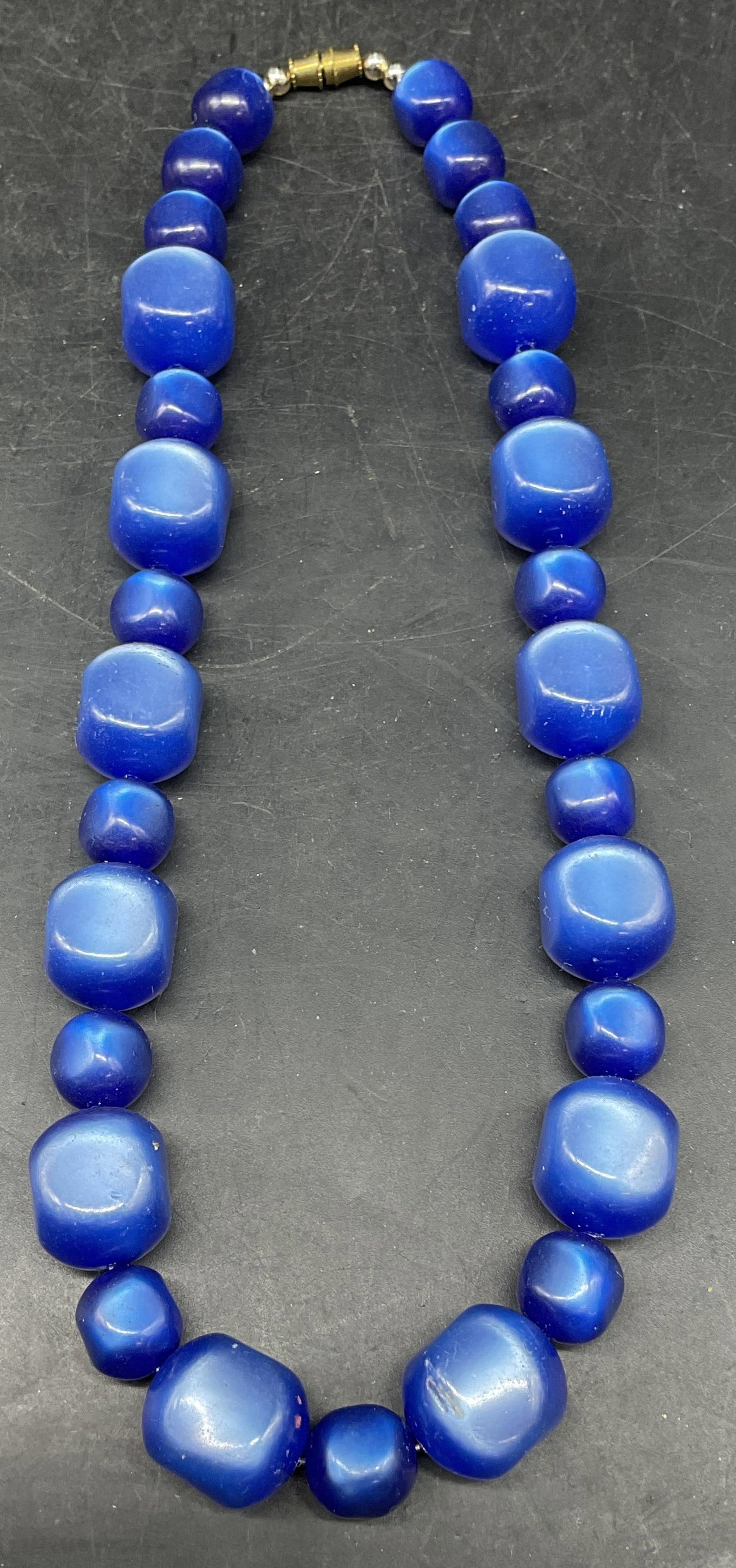 Vintage Iridescent Blue Beaded Necklace: Vintage iridescent blue lucite beaded necklace. Drop length measures approx. 7.5 inches. Some scratching. Jewelry, estate jewelry, costume jewelry, cocktail jewelry, fashion jewelry, accessories, fash