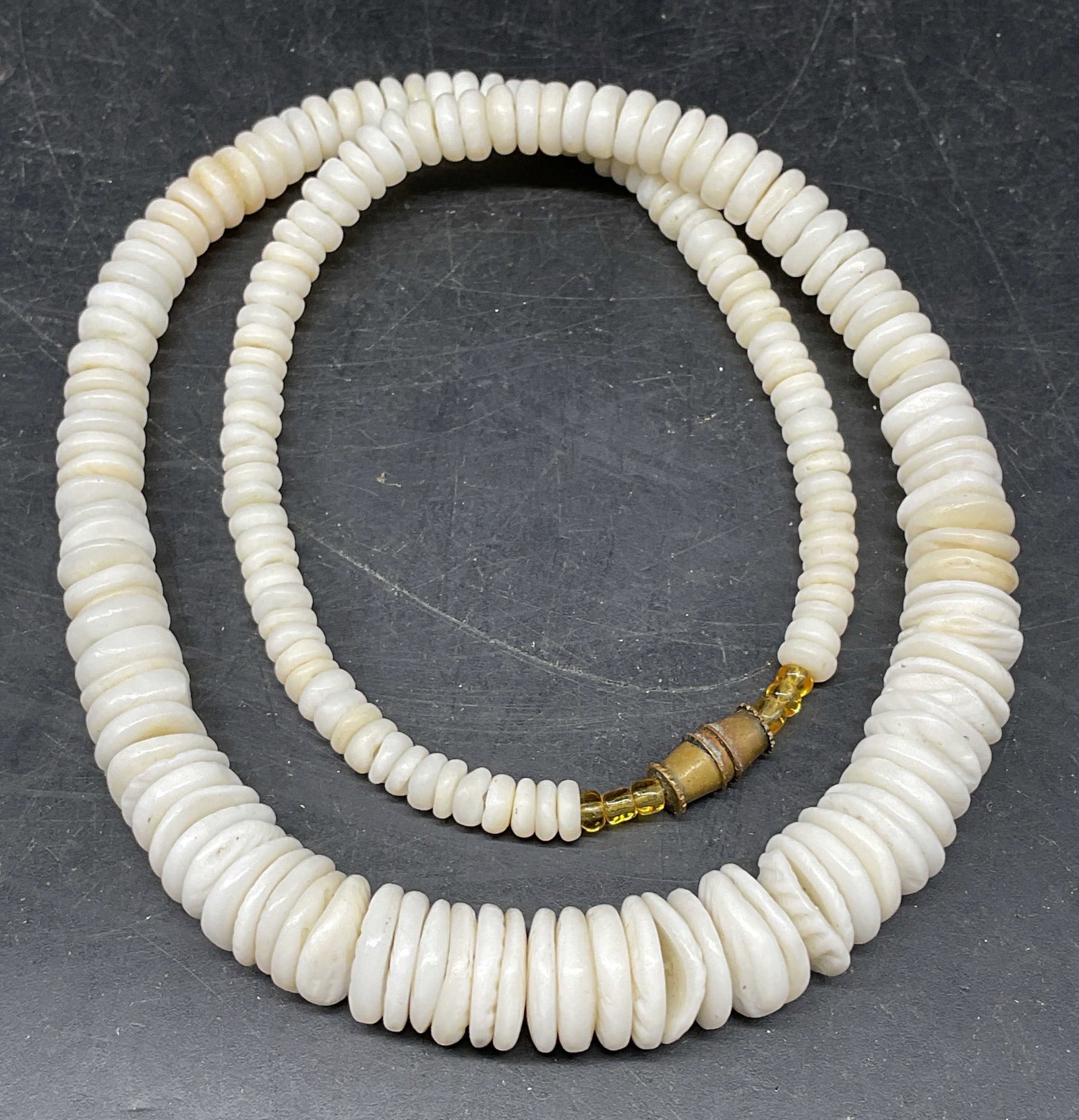 Vintage White Shell Disc Beaded Necklace: Vintage white shell disc beaded necklace. Drop length measures approx. 7 inches. Some scratching. Jewelry, estate jewelry, costume jewelry, cocktail jewelry, fashion jewelry, accessories, fashion acce