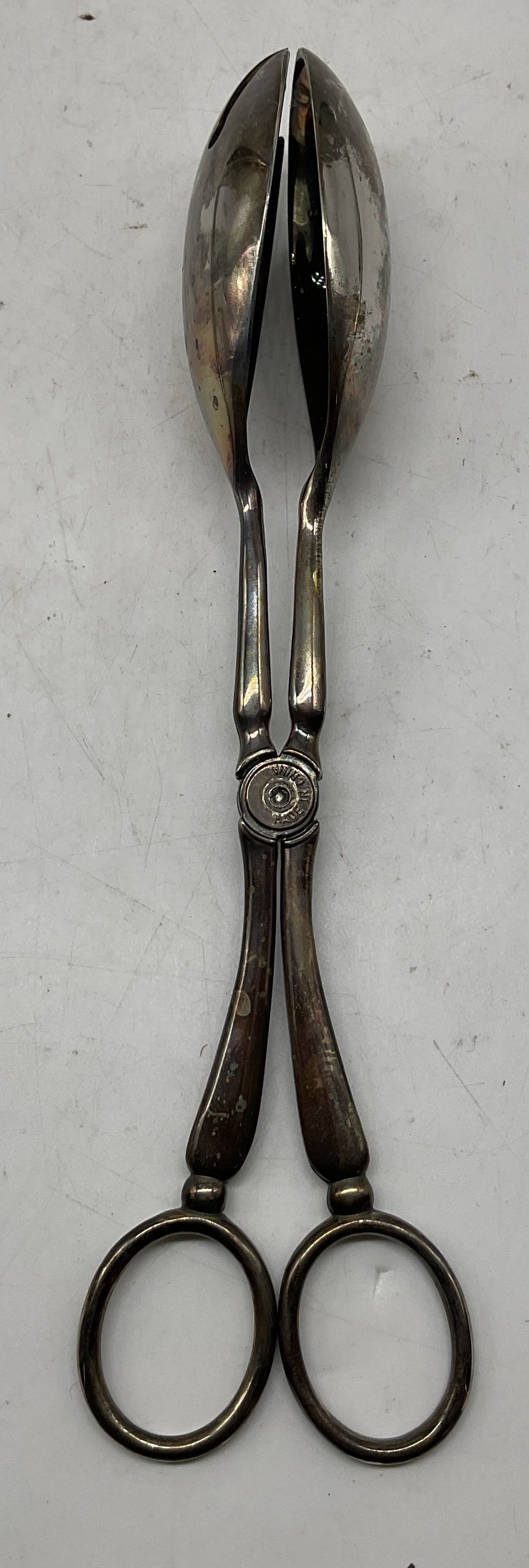 Vintage Silver Plated Serving Tongs: Vintage silver plated serving tongs. Scissor style. Fork and spoon on either side. Measures approx 10 inches in diameter. Some wear to surface. Serving tongs, Serveware, tableware, home decor, table d