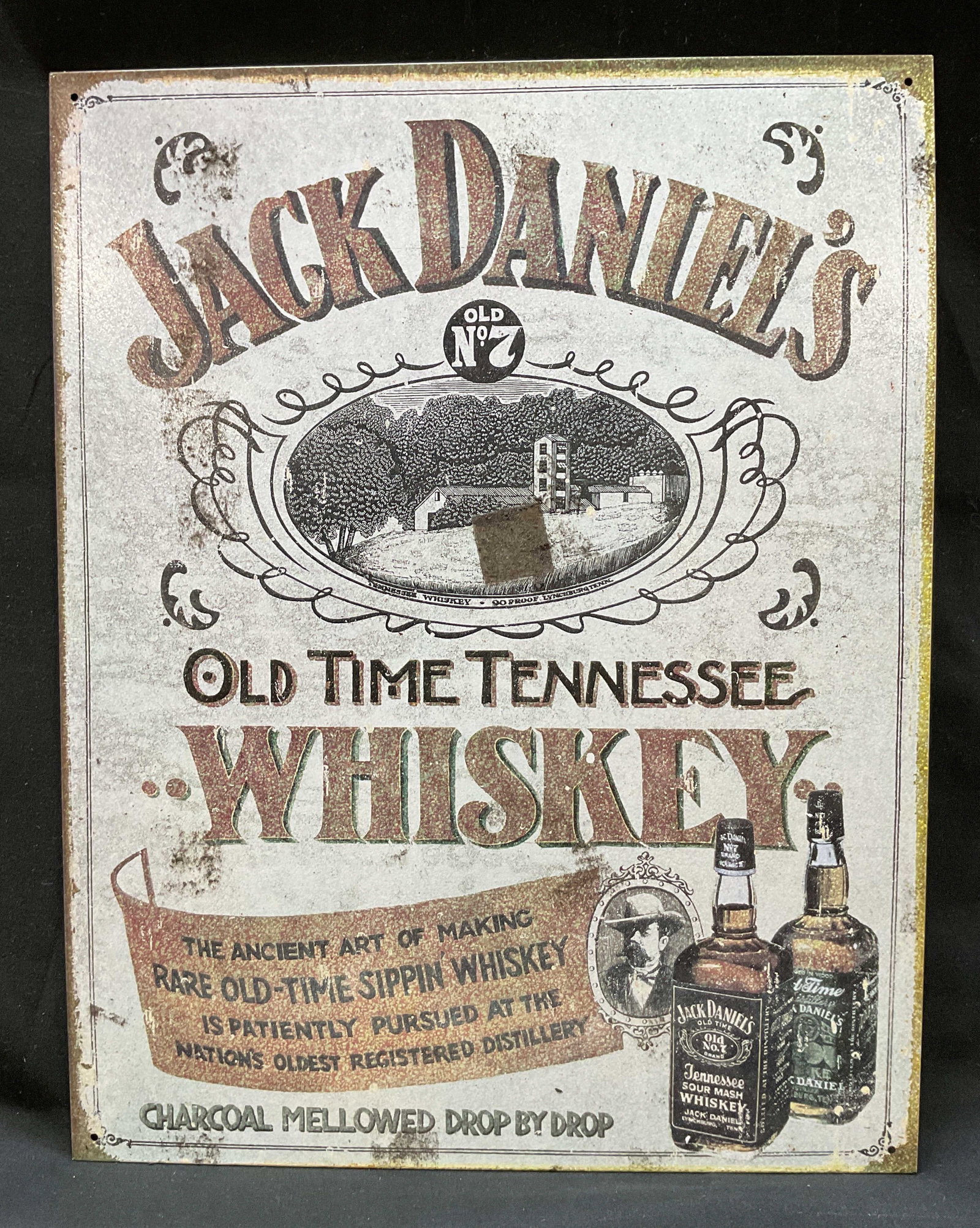 2010 Jack Daniels Whiskey Advertisement Sign USA: 2010 Jack Daniels whiskey advertisement sign. Produced in USA. Tin sign. Illustrated as photographed here. Varying colors. Measures approx 12.5 x 16 inches. Surface wear consistent with exposure.