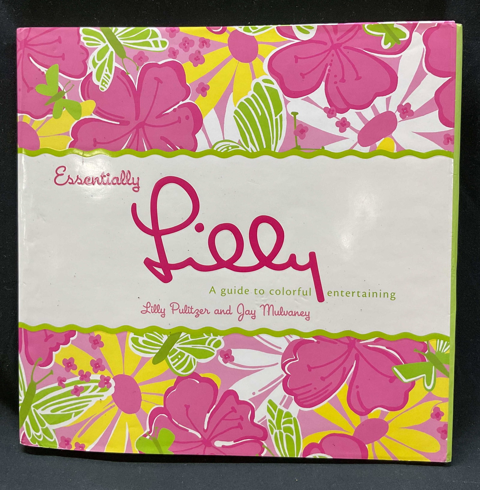 2004 1st Ed Essentially Lily Illus Bk Pulitzer+: Essentially Lily A Guide To Colorful Entertaining by Lily Pulitzer and Jay Mulvaney. Photographs by Ben Fink and illustrations by Izak Zenou. Published by Harper Resource, 2004. First edition. Hard co