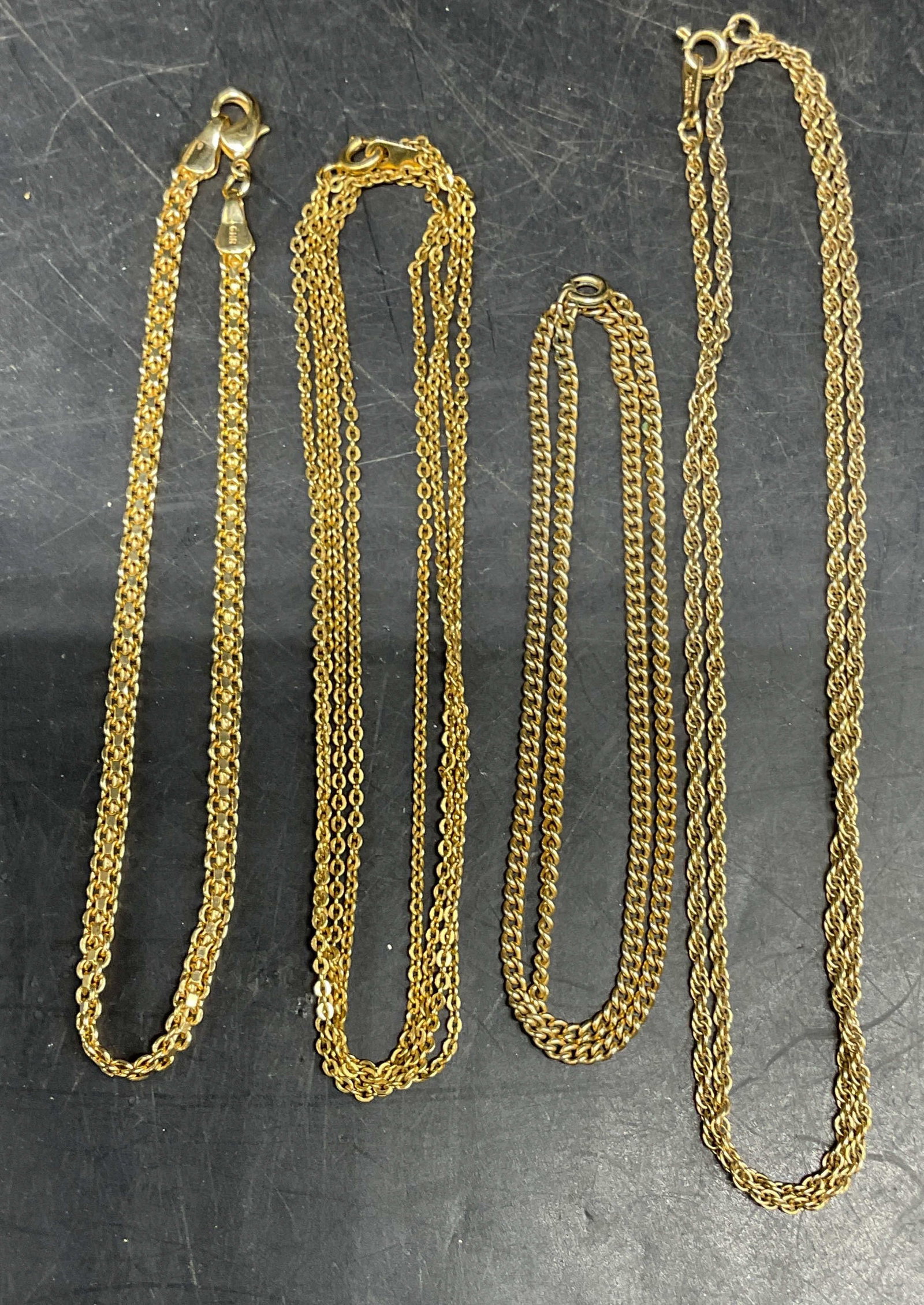 Lot 4 Avon Gold Tone Necklace, GHR Bracelet: Lot of 4 gold tone chain necklaces and bracelet. 1 necklace signed Avon. Bracelet signed GHR. Longest piece drop length 19.5 inches. Some scratching. Jewelry, estate jewelry, costume jewelry,