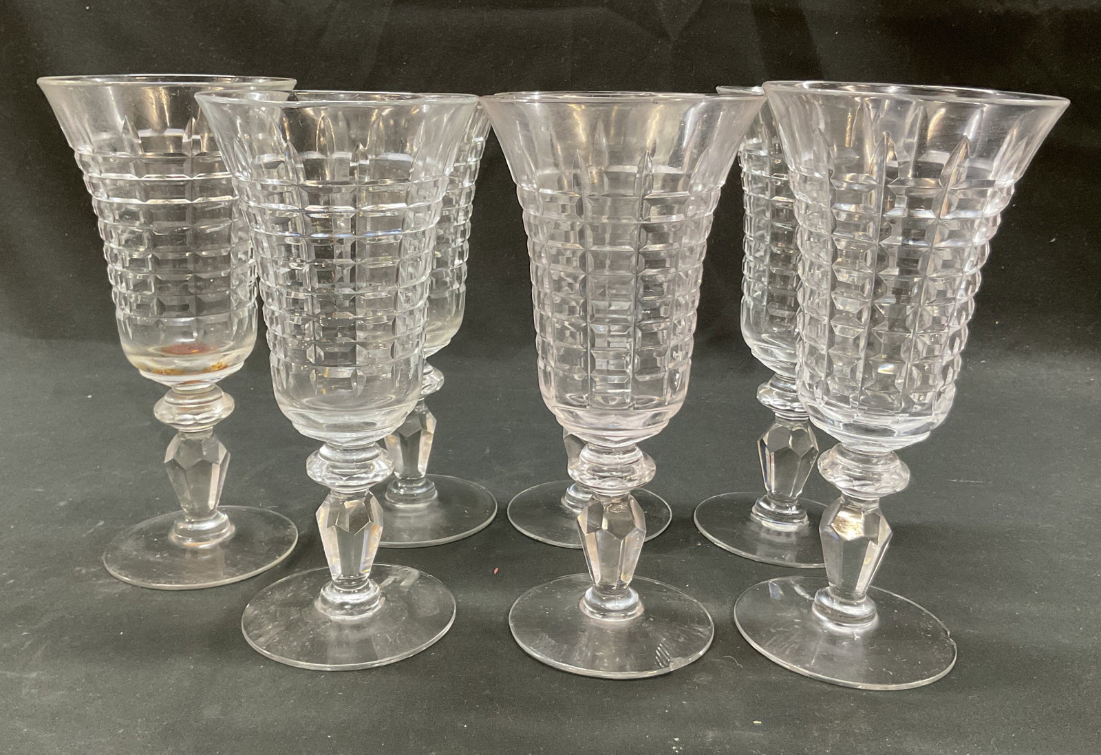 Set 7 Vtg Libbey Crystal Water Goblets: Set of 7 vintage Libbey crystal water goblets. Pattern 1020-3. Round base, faceted diamond shape stem with stacked bulb design. Wide rim. Horizontal and vertical line pattern. Ribbed surface. Measures