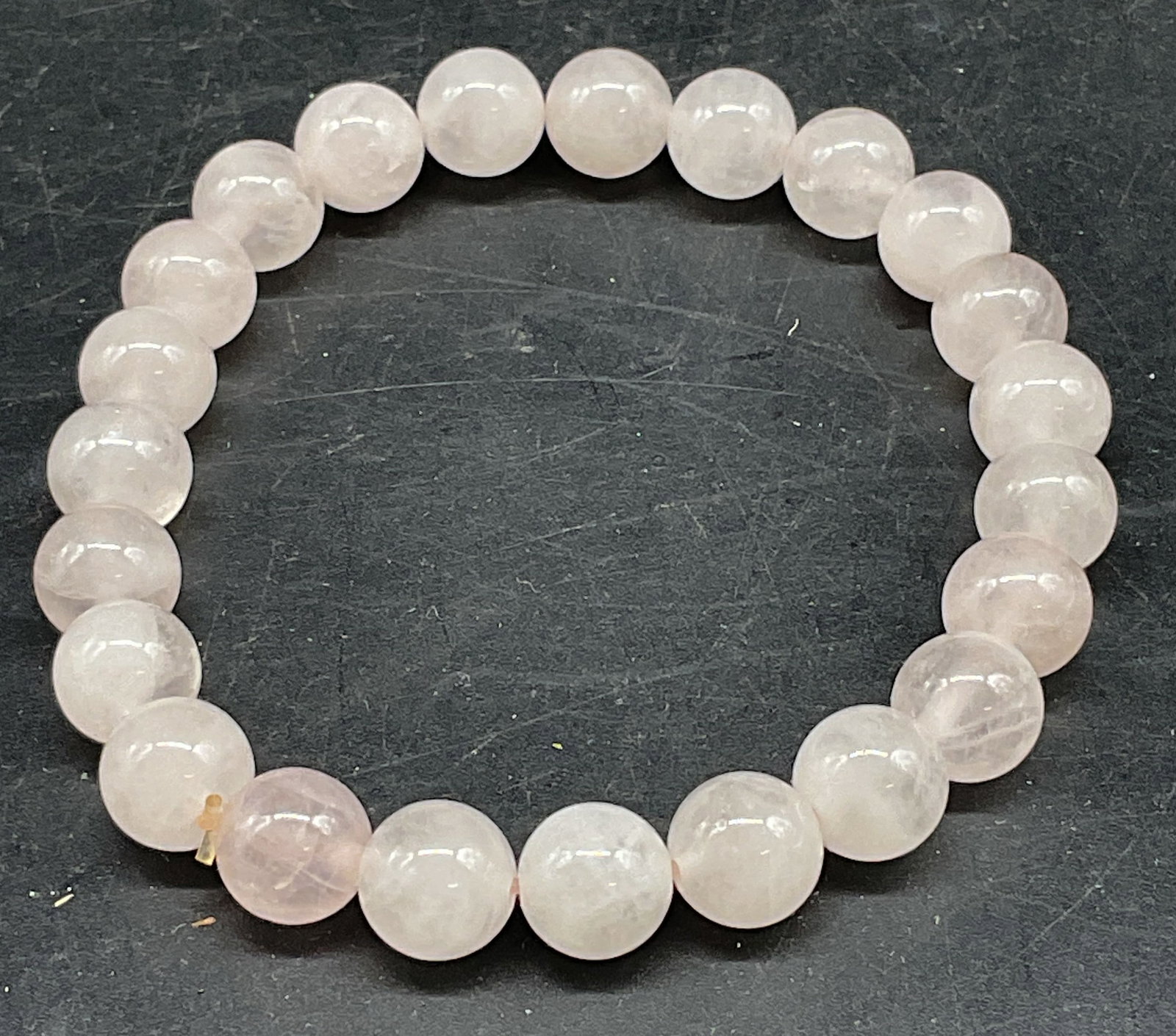 Rose Quartz Semiprecious Beaded Bracelet: Rose quartz semiprecious stone beaded bracelet on elastic band. Measures approx. 2 inches wide. Some scratching. Jewelry, estate jewelry, costume jewelry, cocktail jewelry, fashion jewelry,