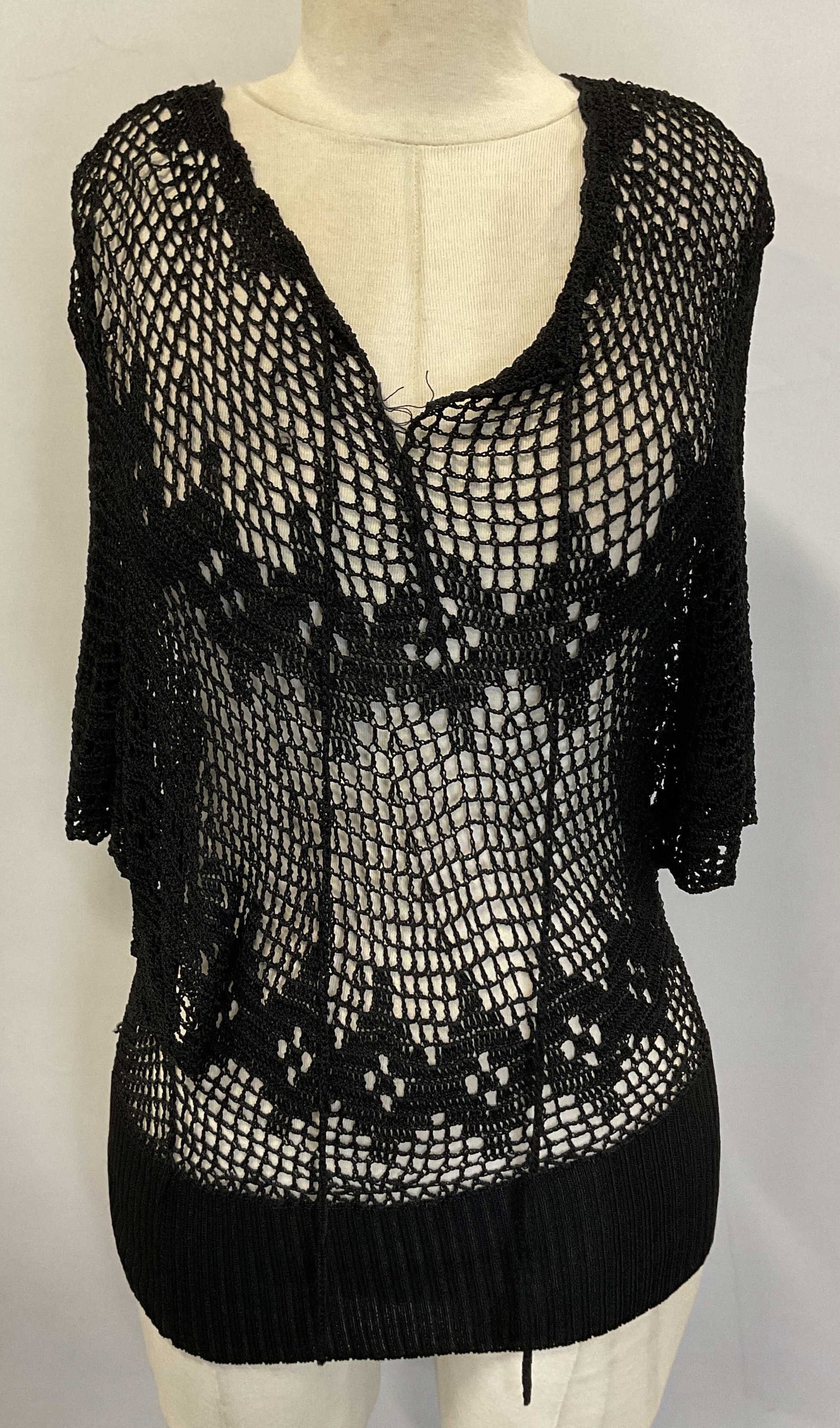 Narcisa Lang Black Crochet Cover Up: Narcisa Lang black crochet bathing suit cover up. 100% rayon. Size M/L. Ornate crochet like designs. Holes and ripping observed. Property of opera singers estate from the renowned & opulent Manhattan 