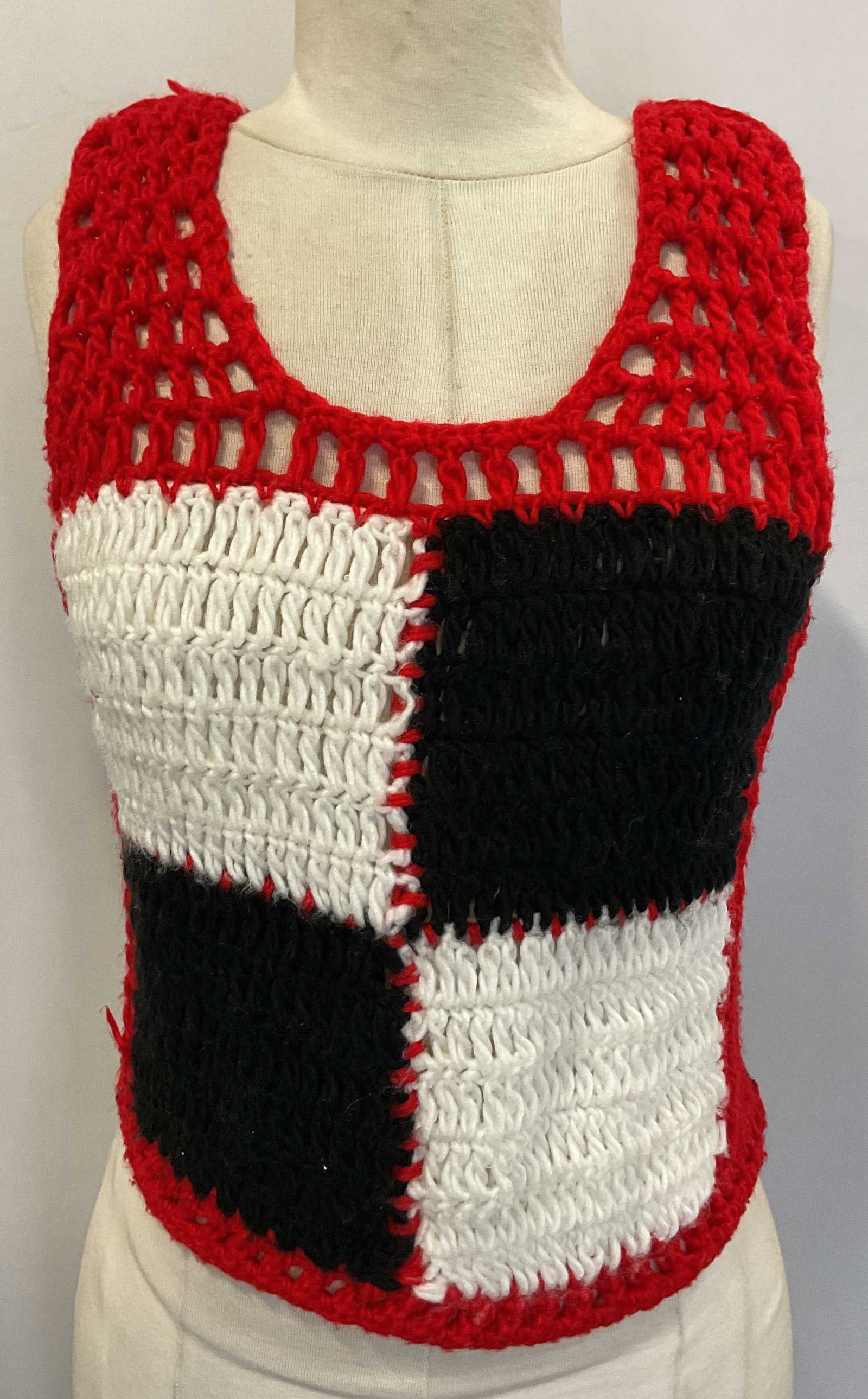Hand Made Crochet Sleeveless Top: Hand made crochet sleeveless top. Red with black and white squares. Measures approx 14.5 inches across chest. Wear consistent with exposure. Property of opera singers estate from the renowned & opulen