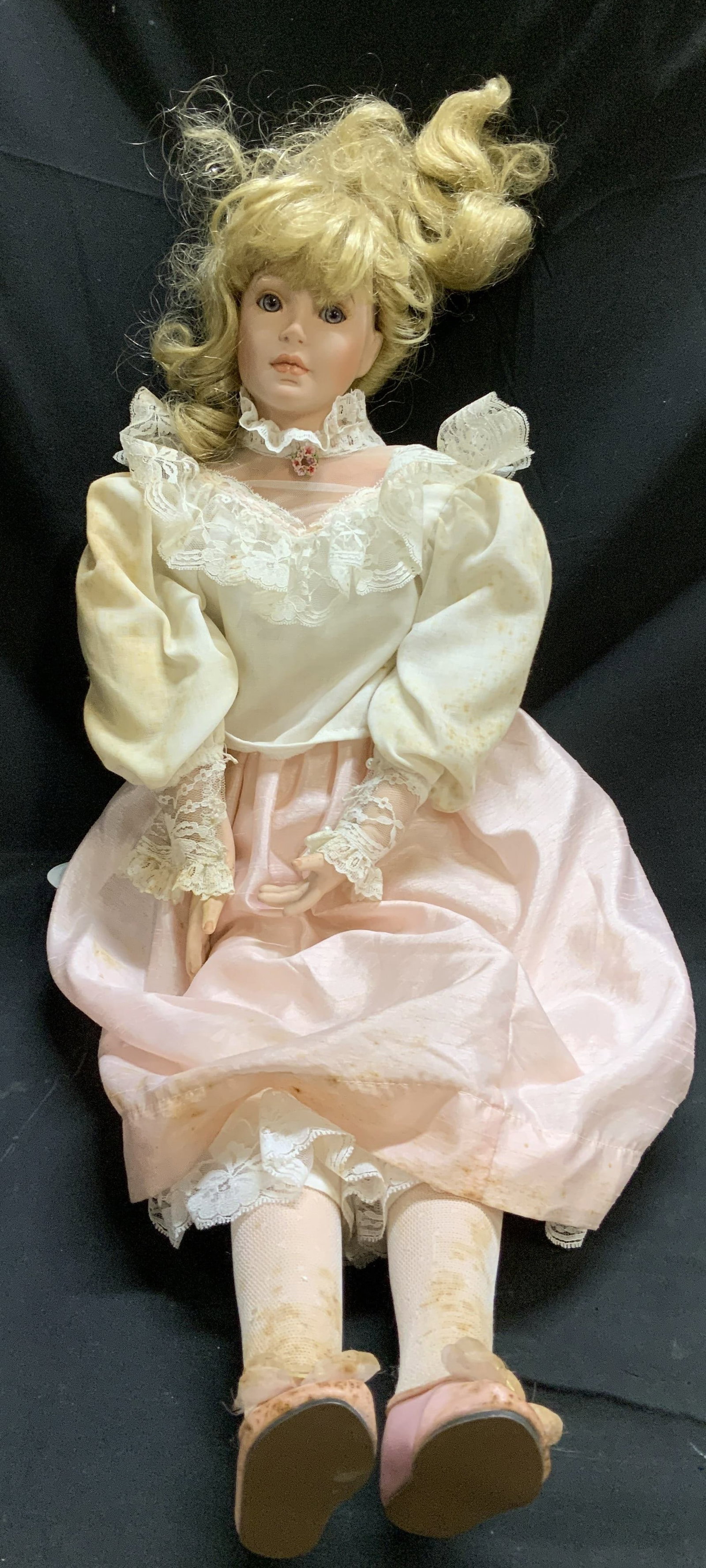 1996 Sgnd Large Porcelain Doll W Stand 29in: 1996 porcelain doll featuring blonde hair, a pink skirt & top with white lace details. Comes with metal stand. Signed & marked. Reads, 1996. Karen M. Rest of lettering is not legible. Sold as is. Surf