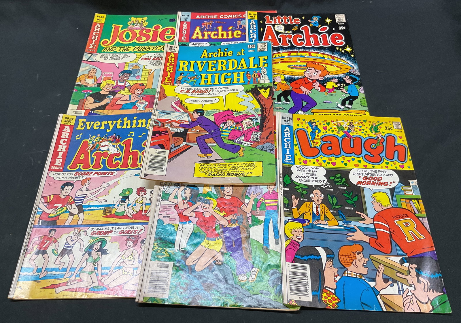 Lot 7 Assorted 1970s Archie Comics: Lot of 7 assorted Archie comics. Ranging in the 1970s. Varying titles. Illustrations in color. Measures approx 7 x 10 inches. Surface wear consistent with exposure. Property of Upper East Side French 