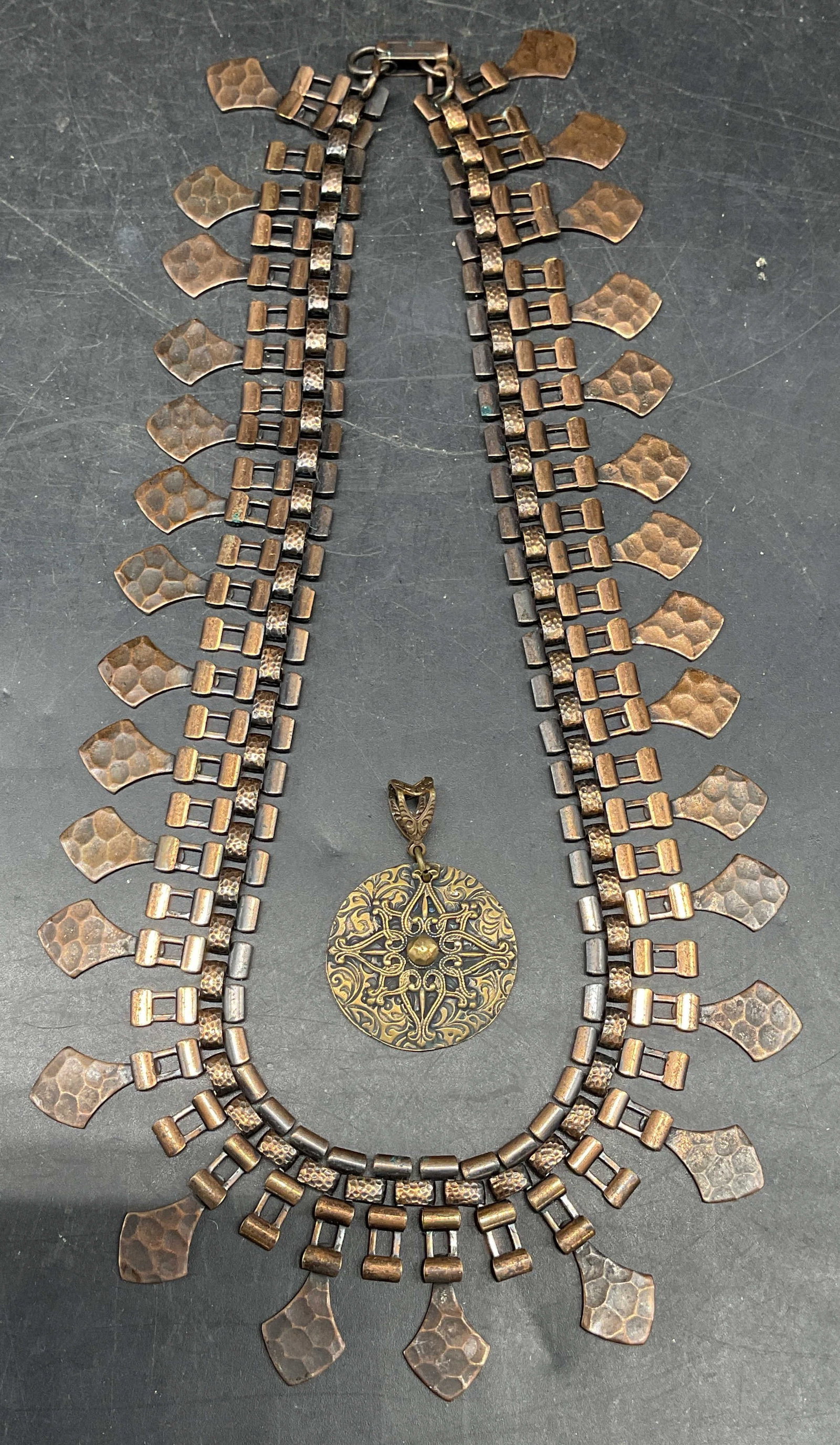 Lot 2 Copper Collar Necklace, Gold Tn Pendant: Lot of 2 pieces. Vintage copper panel collar necklace. Drop length 7.25 inches. Vintage gold tone ornate floral pendant. Measures approx. 1 inch wide. Some scratching. Jewelry, estate jewelry, costume