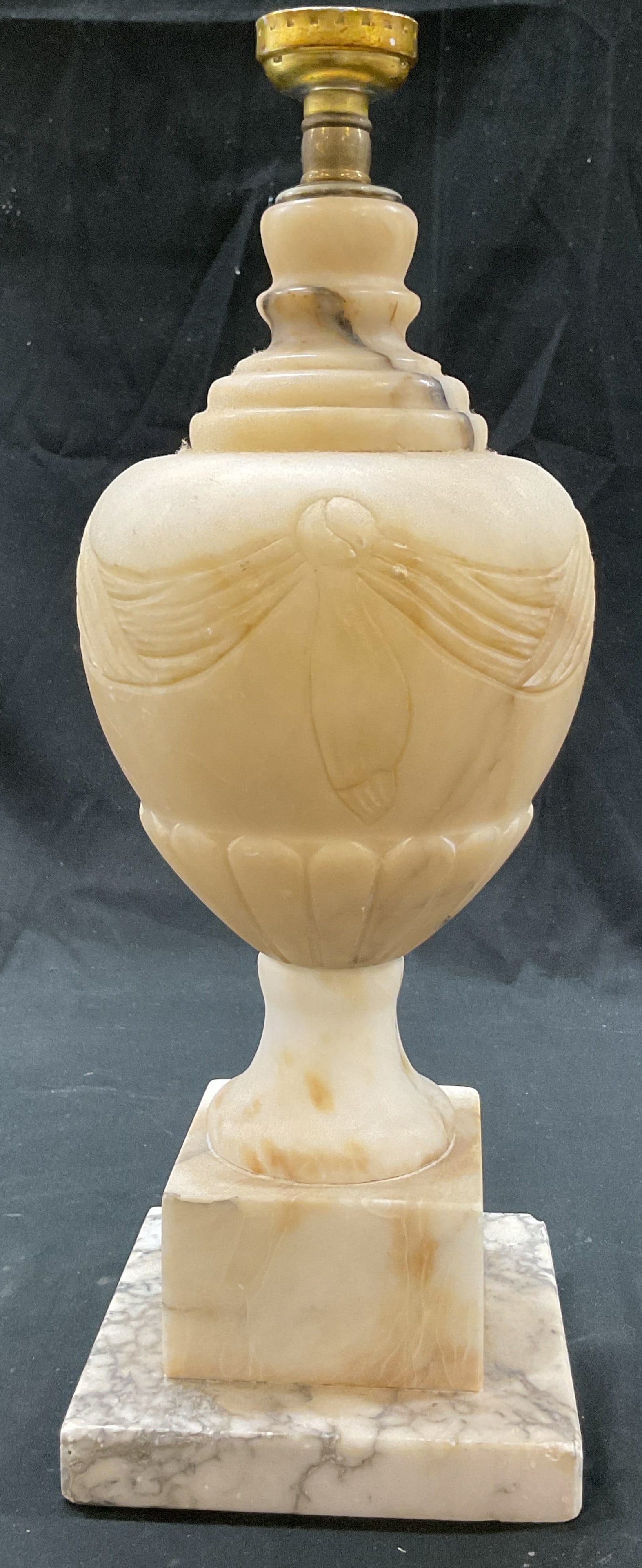 Vintage White Carved Stone Lamp Base: Vintage white carved stone lamp base. Square and pedestal base. Bulbous body with carved design. Ribbed surface. Some weight. Measures approx 4.5 x 4.5 x 13 inches. Sold as is, not tested. Some scratc