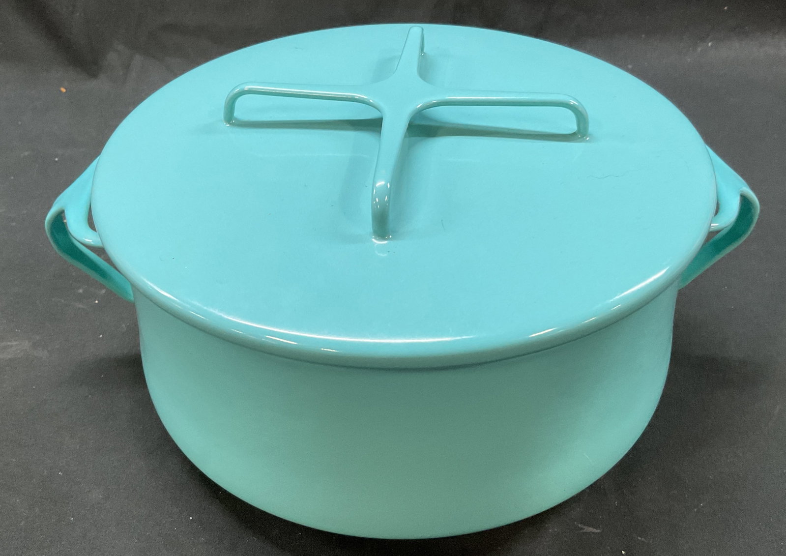 Dansk Kobenstyle Blue Enamelware Dutch Oven Pot: Dansk Kobenstyle blue enamelware Dutch oven pot. Marked on underside, reads Dansk Kobenstyle. Bright blue color. Handles on either side. Comes with lid with decorative handle. Circular shape.