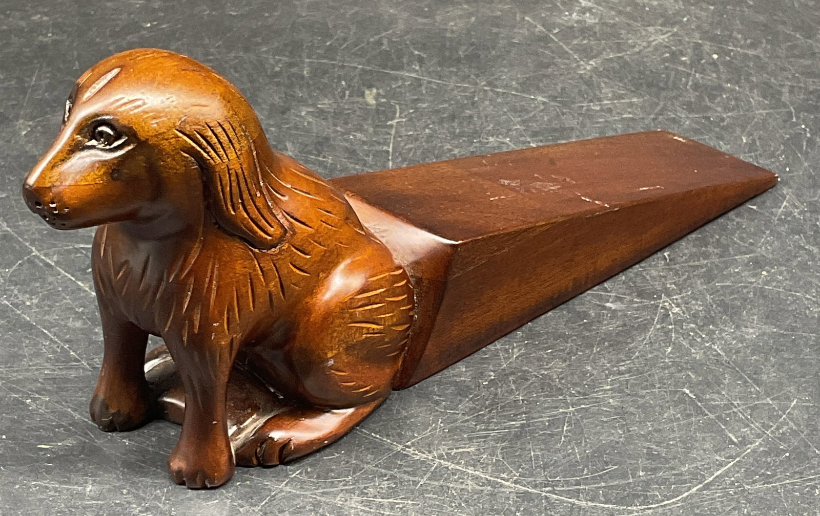 Hand Carved Wood Dog Door Stopper: Hand carved wood door stopped with dog motif. Measures approx. 7.75 x 1.75 x 3.25 inches. Door stopper, dog door stopper, home decor, home accessories, homewares, 10 s