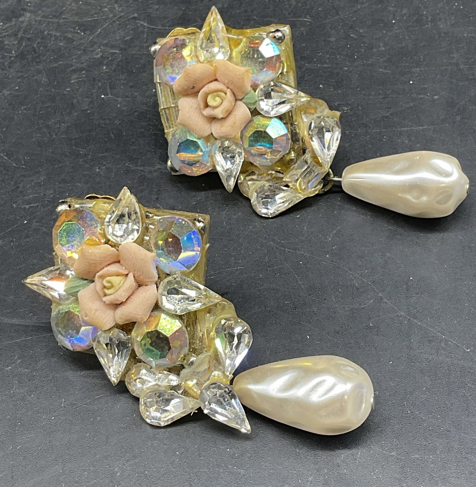 Vintage Faux Pearl Flower Statement Earrings: Vintage stamens earrings. Faux pearls, flower, and crystal decoration. Measures approx. 2.5 inches long. Some scratching, one crystal needs replacement. Previously repaired. Jewelry, estate jewelry,