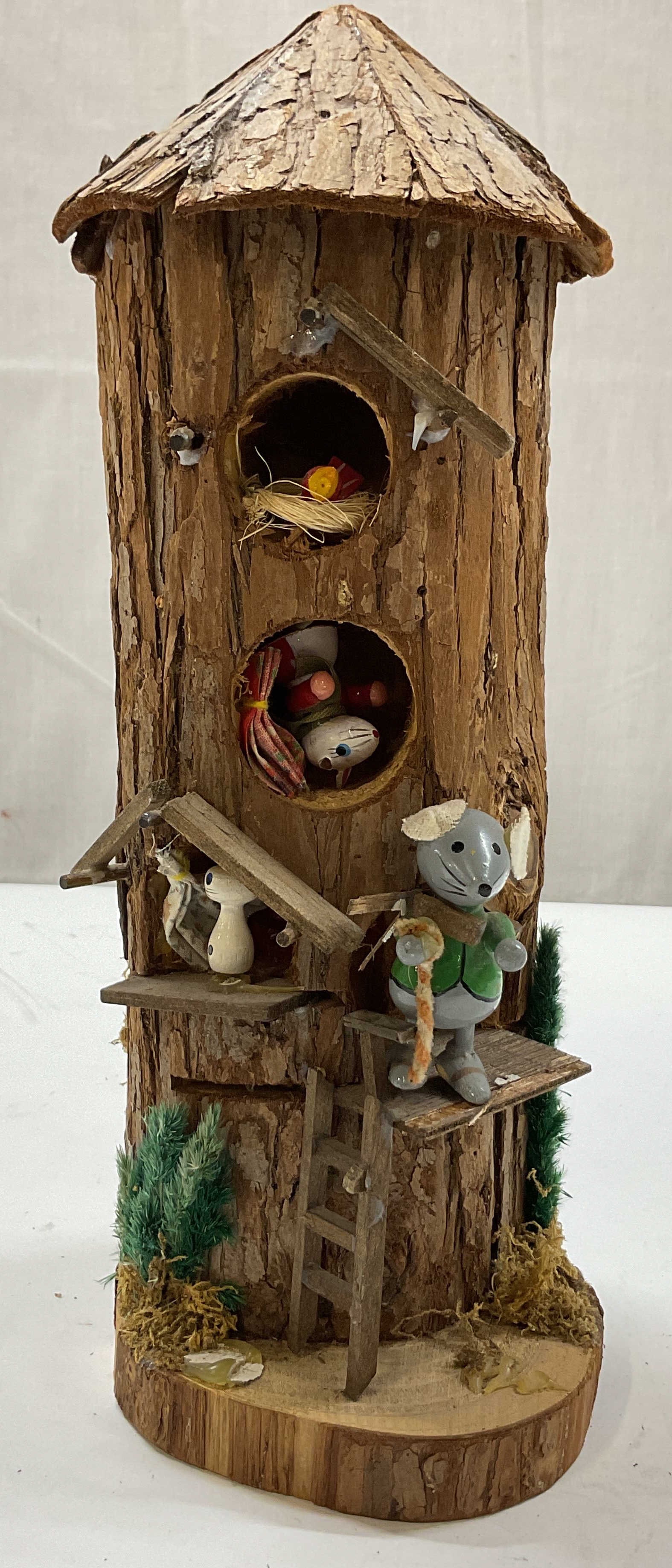 Vintage Hand Crafted Decorative Woodland Treehouse: Vintage hand crafted decorative woodland treehouse. Whimsical treehouse figure. Crafted from tree trunk. Populated with detailed miniatures including a mouse and various small animals. Forest