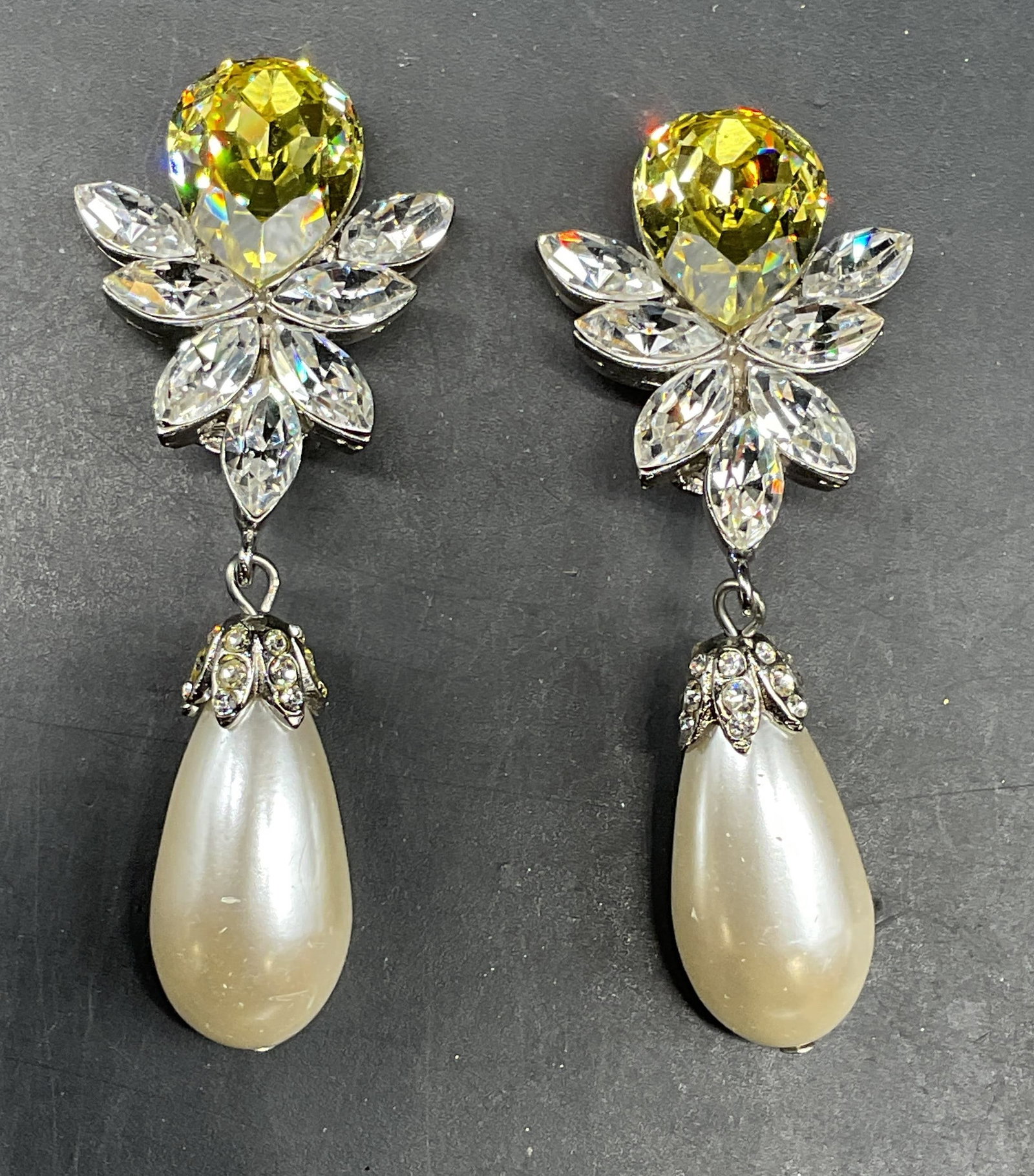 Vintage Todd Anthony Faux Pearl & Crystal Earrings: Vintage signed Todd Anthony silver tone statement earrings with green and colorless crystals and faux pearl decoration. Measures approx. 2.5 x 1 inches. Some scratching. Jewelry, estate jewelry, costu