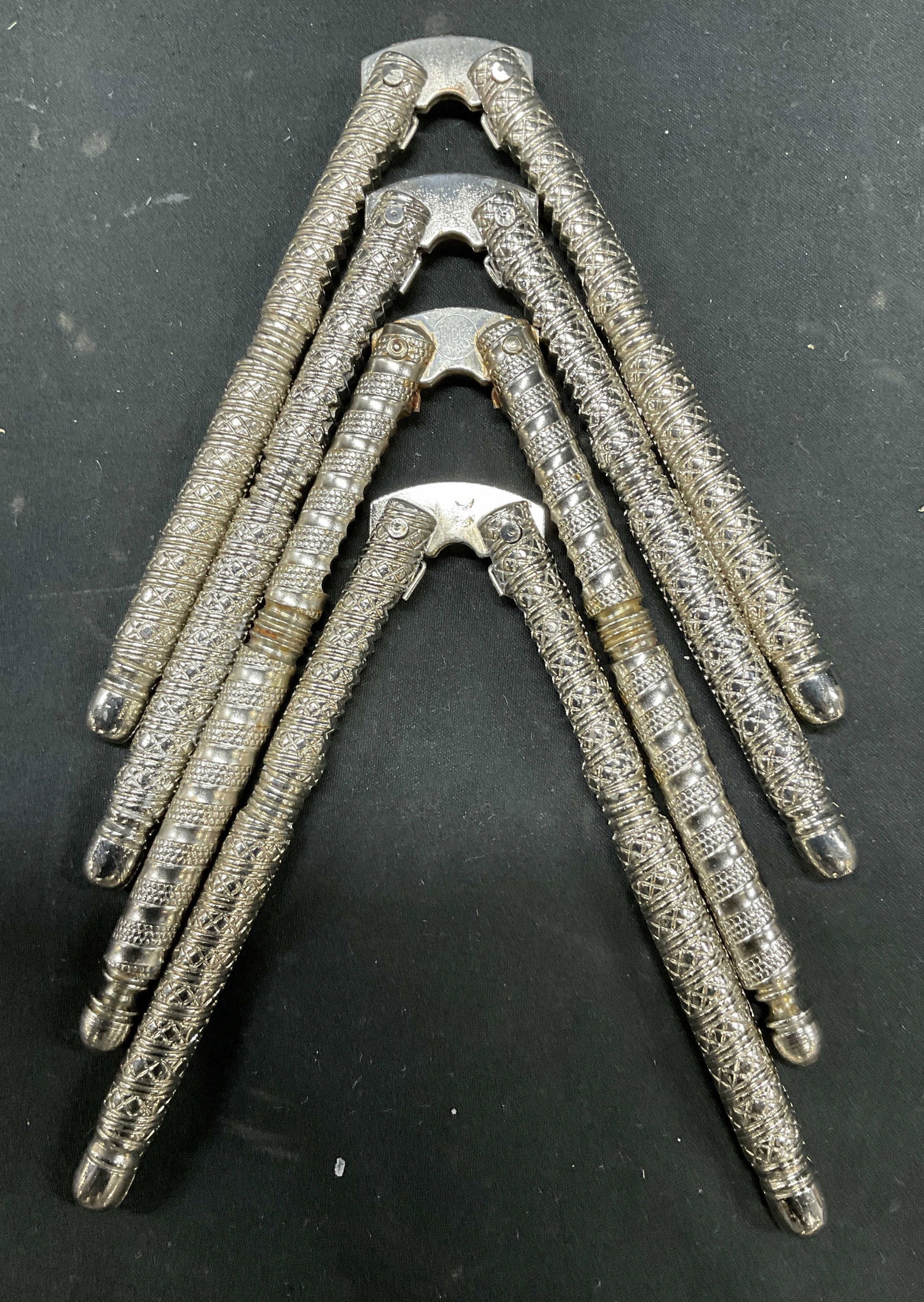 Set 4 HMQ stainless steel nutcrackers: Henry Marcus Quackenbush set of 4 spring loaded stainless steel nutcrackers also used for lobster and crab, each measures app 5 inches