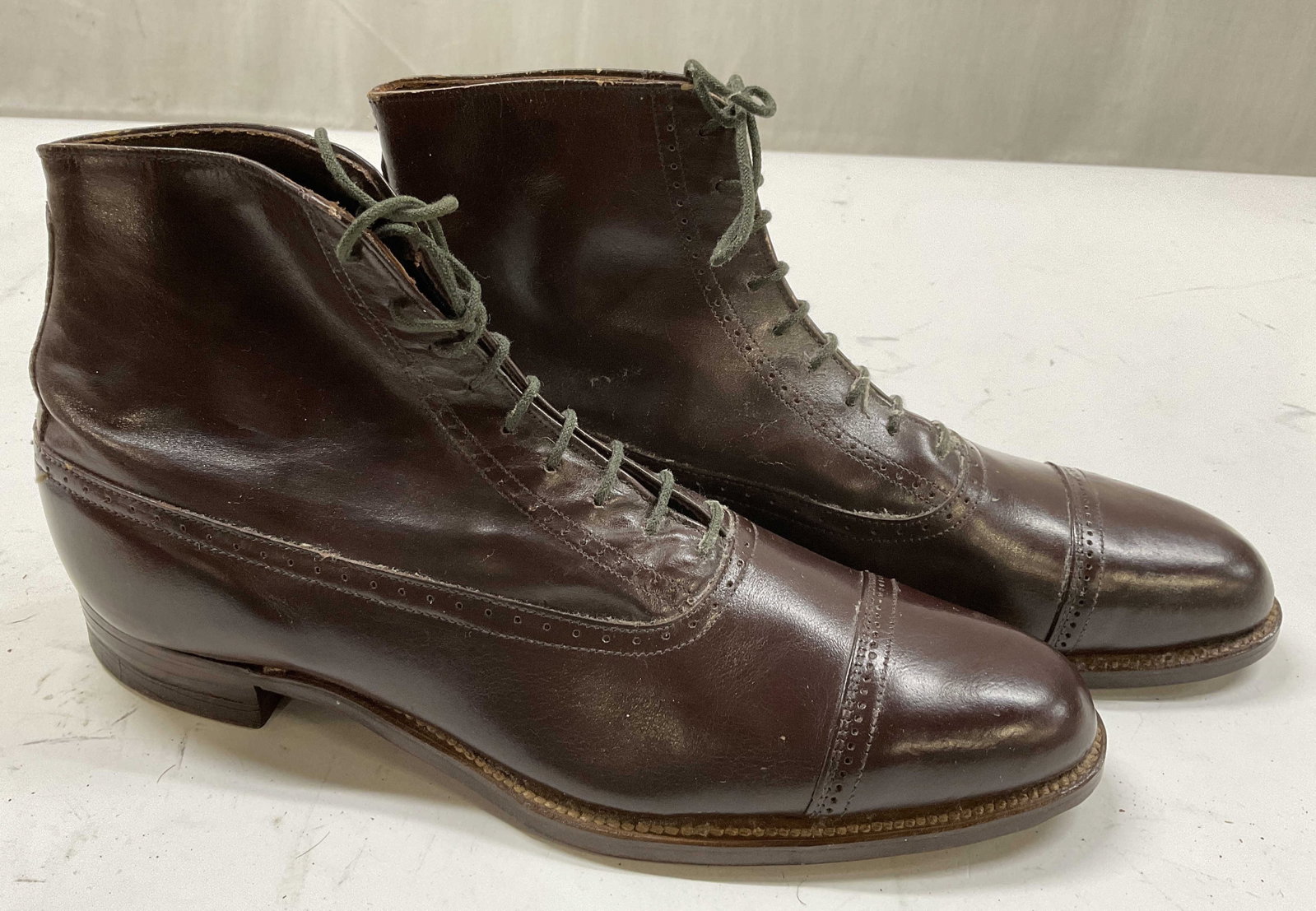 Pr Tom Logan Leather Lace Up Ankle Shoes: Underside marked for Tom Logan , also reads all solid leather and additional illegible writing, , brand name also appears inside ankle trim , lined with graphic fabric, also described as brown