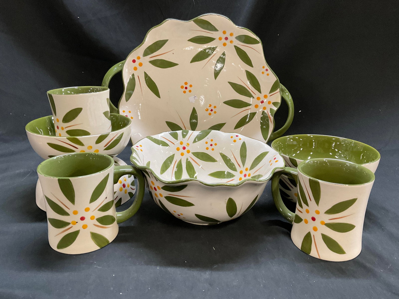 9pcs Temptations Ceramic Set: Flower and leaf design stylized in Green and yellow, includes double handled platter measures app 14.5 by 13 inches, large bowl diameter 9 inches ht 5 inches, 4 bowls diameter 7 inches and three mugs,
