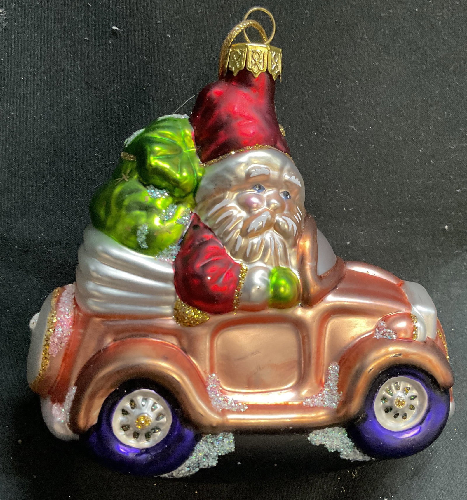 Vintage Glass Santa In Car Ornament: Vintage glass ornament of Santa sitting in a convertible car, Christmas decor, holiday decor measures ht app 5 inches, length app 5 inches, smalls
