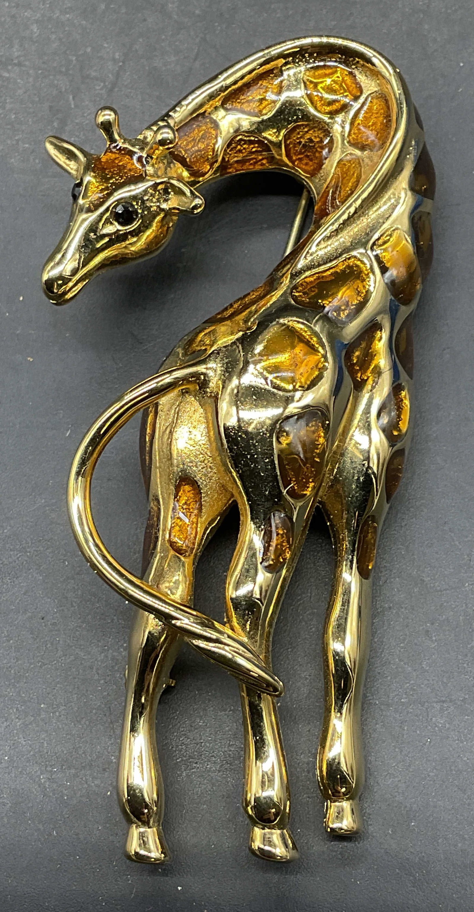 Vintage FO Gold Tone Enamel Giraffe Brooch: Vintage FO gold tone enamel and crystal giraffe brooch. Measures approx. 2.75 x 1.25 inches. Some scratching. Jewelry, costume jewelry, cocktail jewelry, fashion jewelry, accessories, fashion accessor