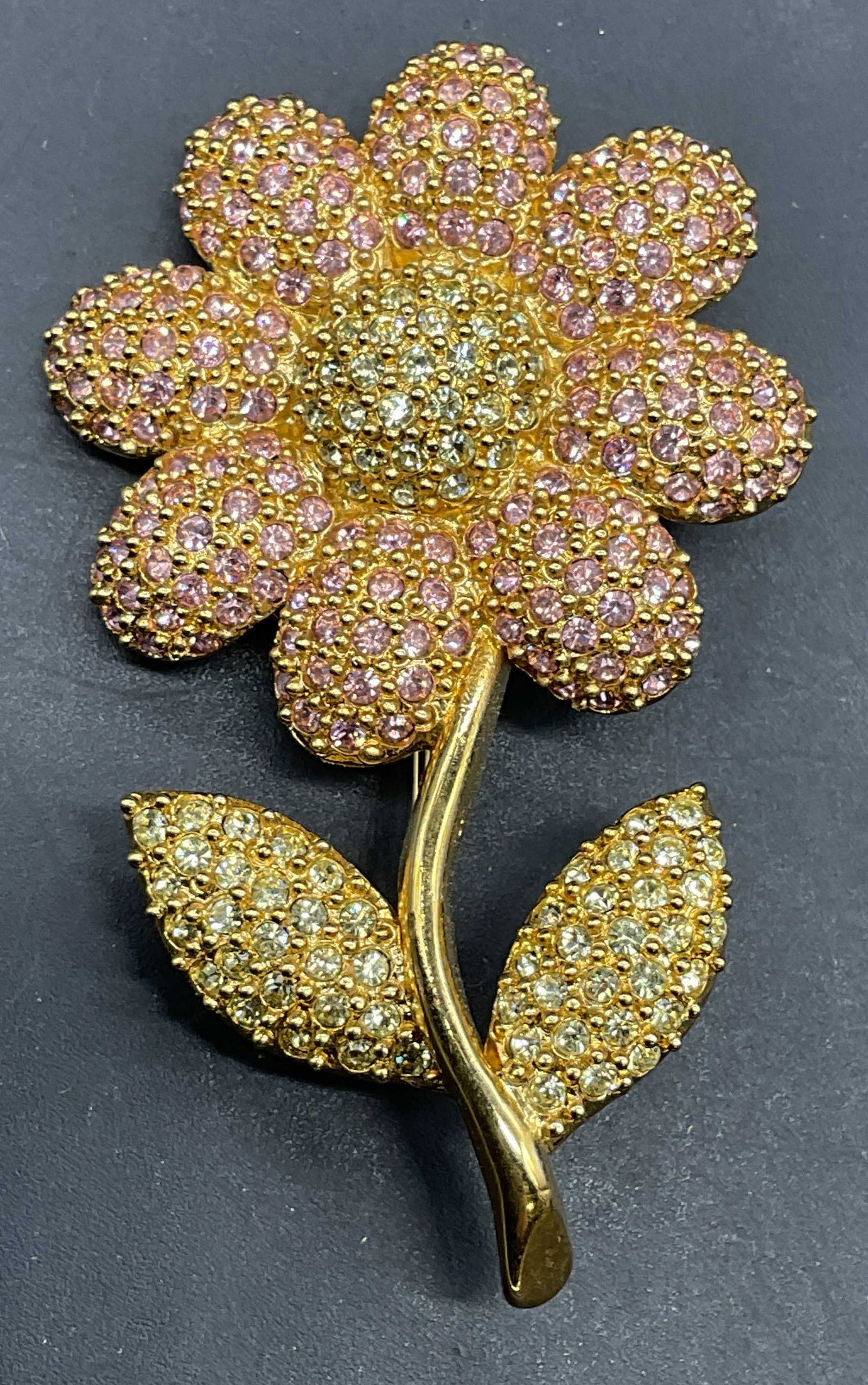 Vintage Napier Gold Tone Crystal Flower Brooch: Vintage Napier gold tone crystal flower brooch. Measures approx. 2.25 x 1.25 inches. Some scratching. Jewelry, costume jewelry, cocktail jewelry, fashion jewelry, accessories, fashion accessories, wea