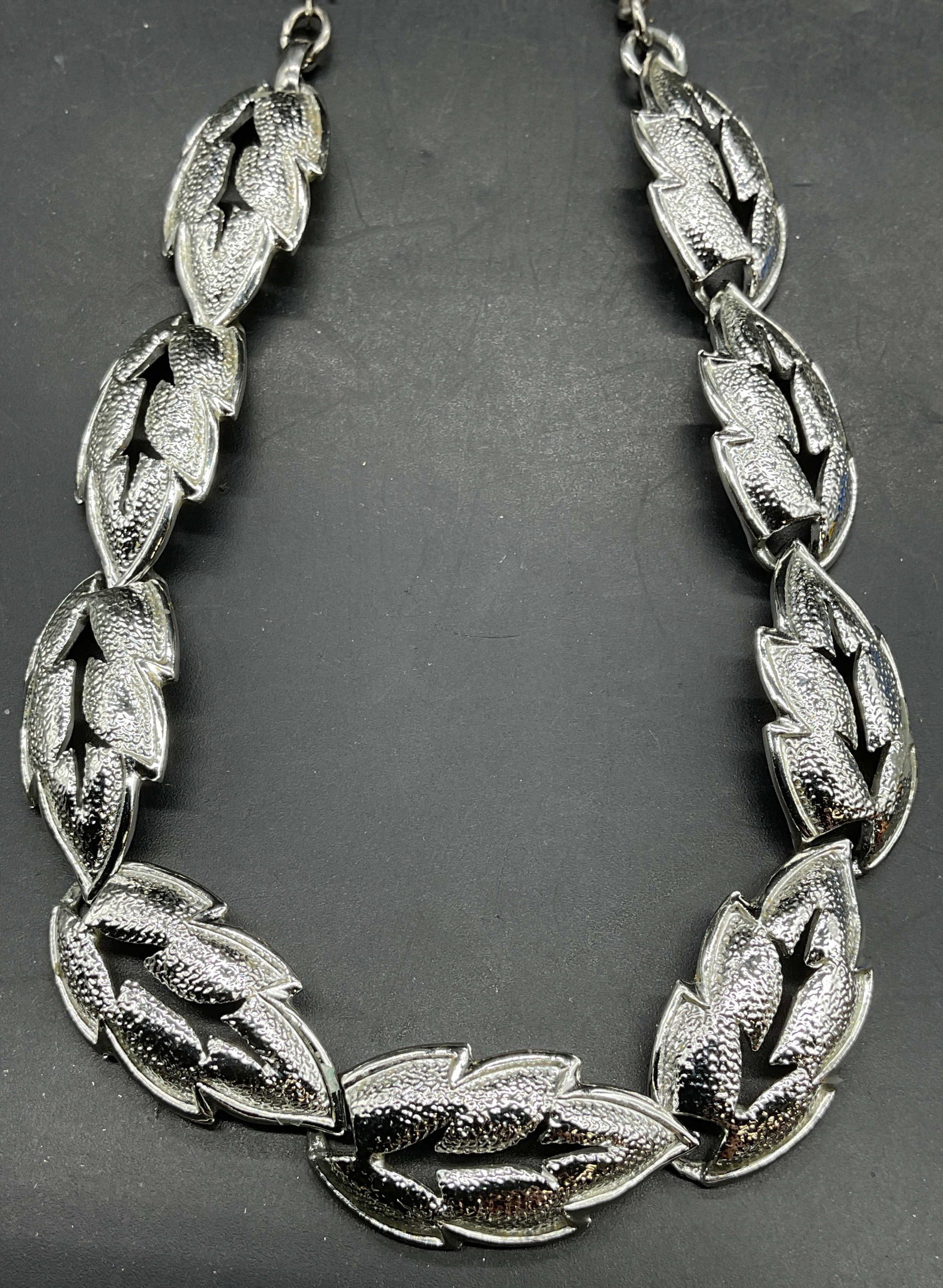 Vintage Signed Silver Tone Leaf Necklace: Vintage signed silver tone leaf panel necklace. Signed illegibly. Drop length 7.5 inches. Some scratching. Jewelry, estate jewelry, costume jewelry, cocktail jewelry, fashion jewelry, accessories,