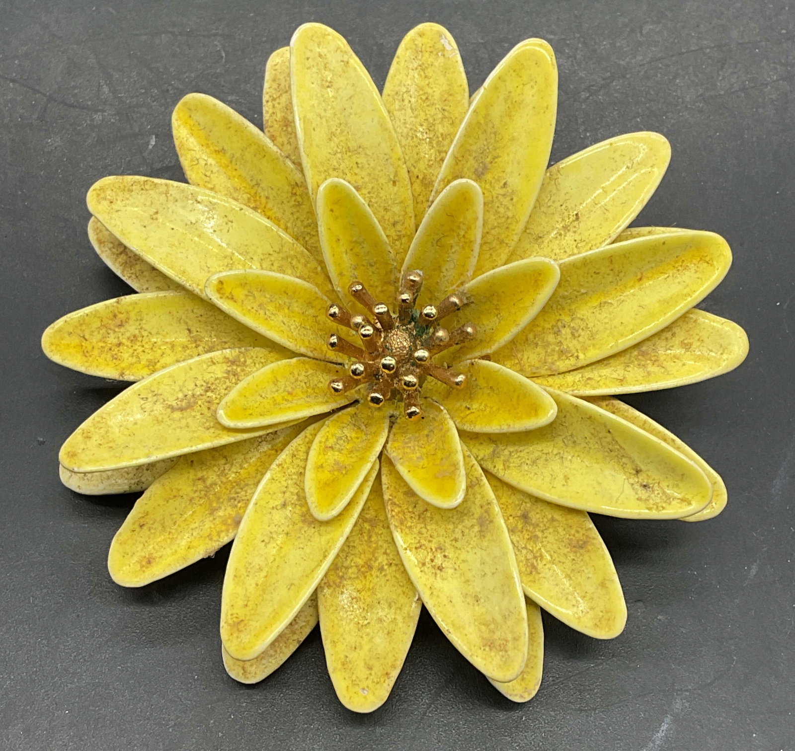 Vintage Trifari Yellow Enamel Flower Brooch: Vintage Trifari gold tone yellow enameled flower brooch. Measures approx. 2.5 inches wide. Some scratching and residue. Jewelry, estate jewelry, costume jewelry, cocktail jewelry, fashion jewelry, acc