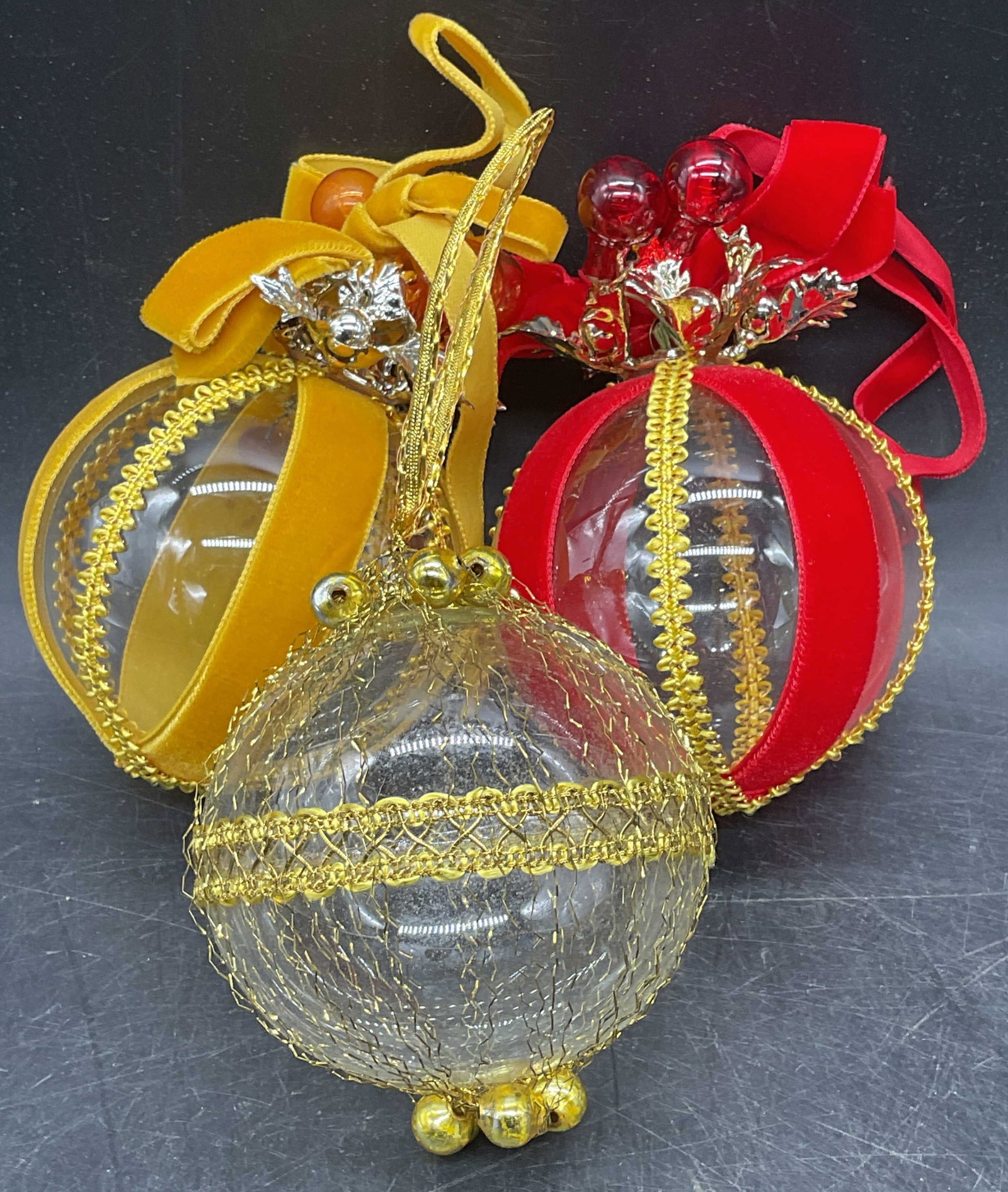 Lot 3 Vintage Blown Glass Velvet Ornaments: Lot of 3 blown glass ornaments with velvet and wire trims. Measures approx. largest Approx 4.5 inches long, includes a box. Some wear to all consistent with exposure. Blown glass ornament, ball