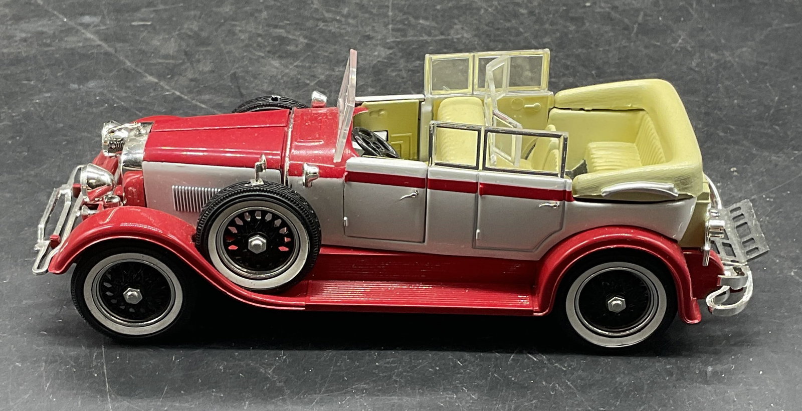 Arko Model Car 1928 Lincoln Dietrich Convertible: 2003 Arko model car. 1928 Lincoln L Dietrich Convertible in red and white. Measures approx. 6.5 x 2 x 2.25 inches. Some scratching. Arko model car, model car, toy car, collectibles, home decor, table 