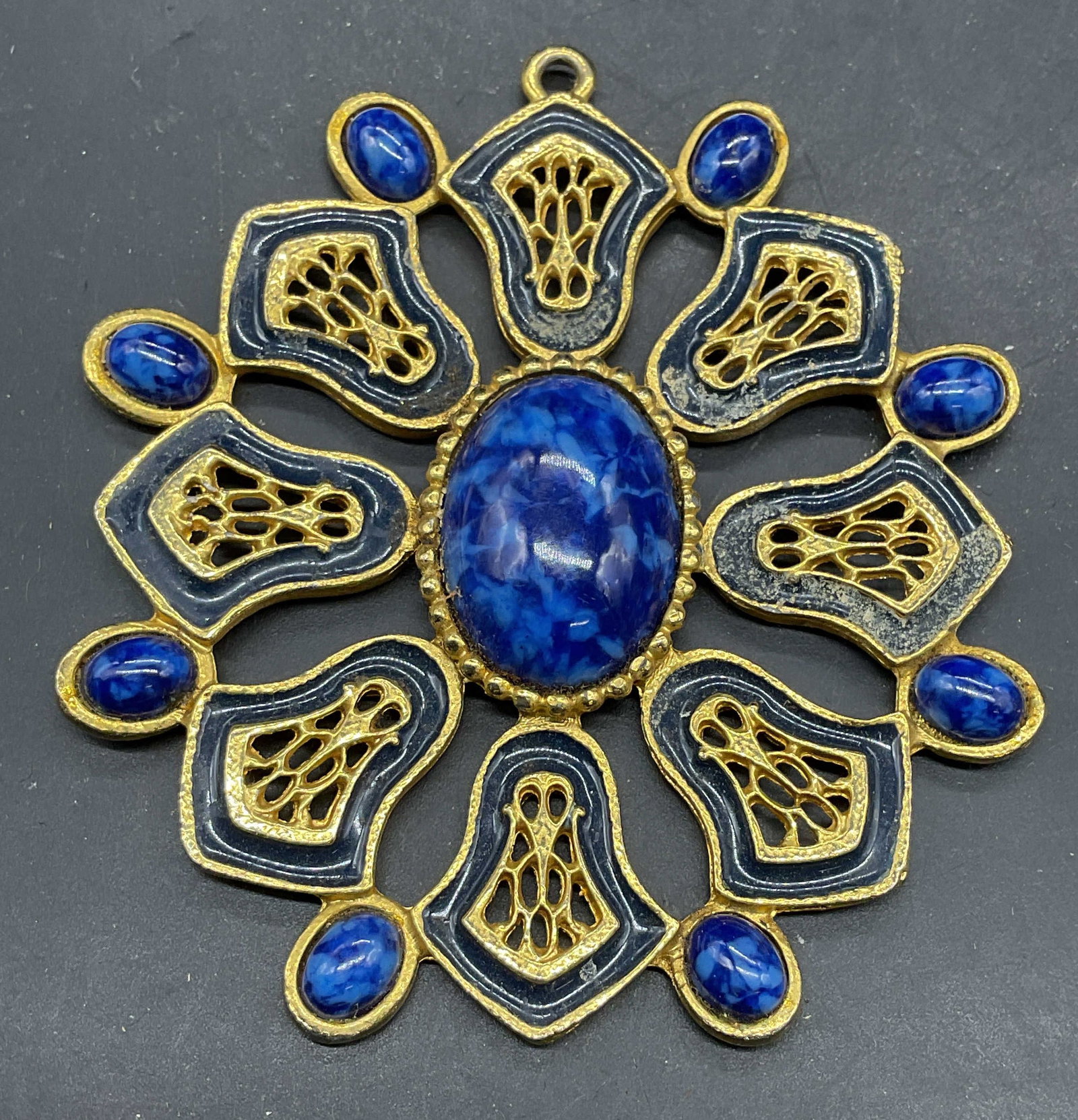 Gold Tone Blue Faux Stone Statement Pendant 3 In: Gold tone blue enamel and faux stone statement pendant. Measures approx. 3 x 3 inches. Some scratching. Jewelry, estate jewelry, costume jewelry, cocktail jewelry, fashion jewelry, accessories, fashio