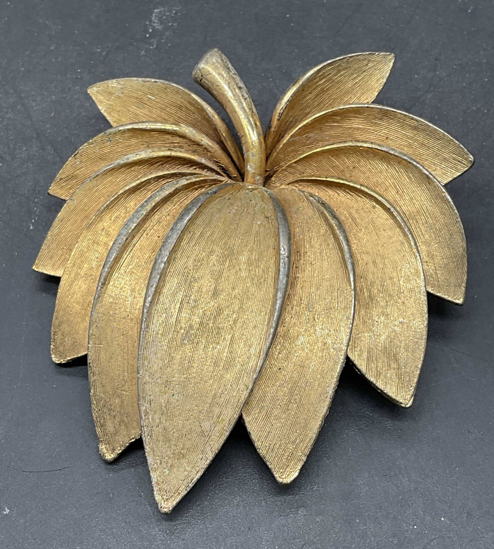Vintage Brushed Gold Tone Leaf Brooch: Vintage brushed gold tone leaf brooch. Measures approx. 2.5 x 2.25 inches. Some scratching. Jewelry, estate jewelry, costume jewelry, cocktail jewelry, fashion jewelry, accessories, fashion accessorie