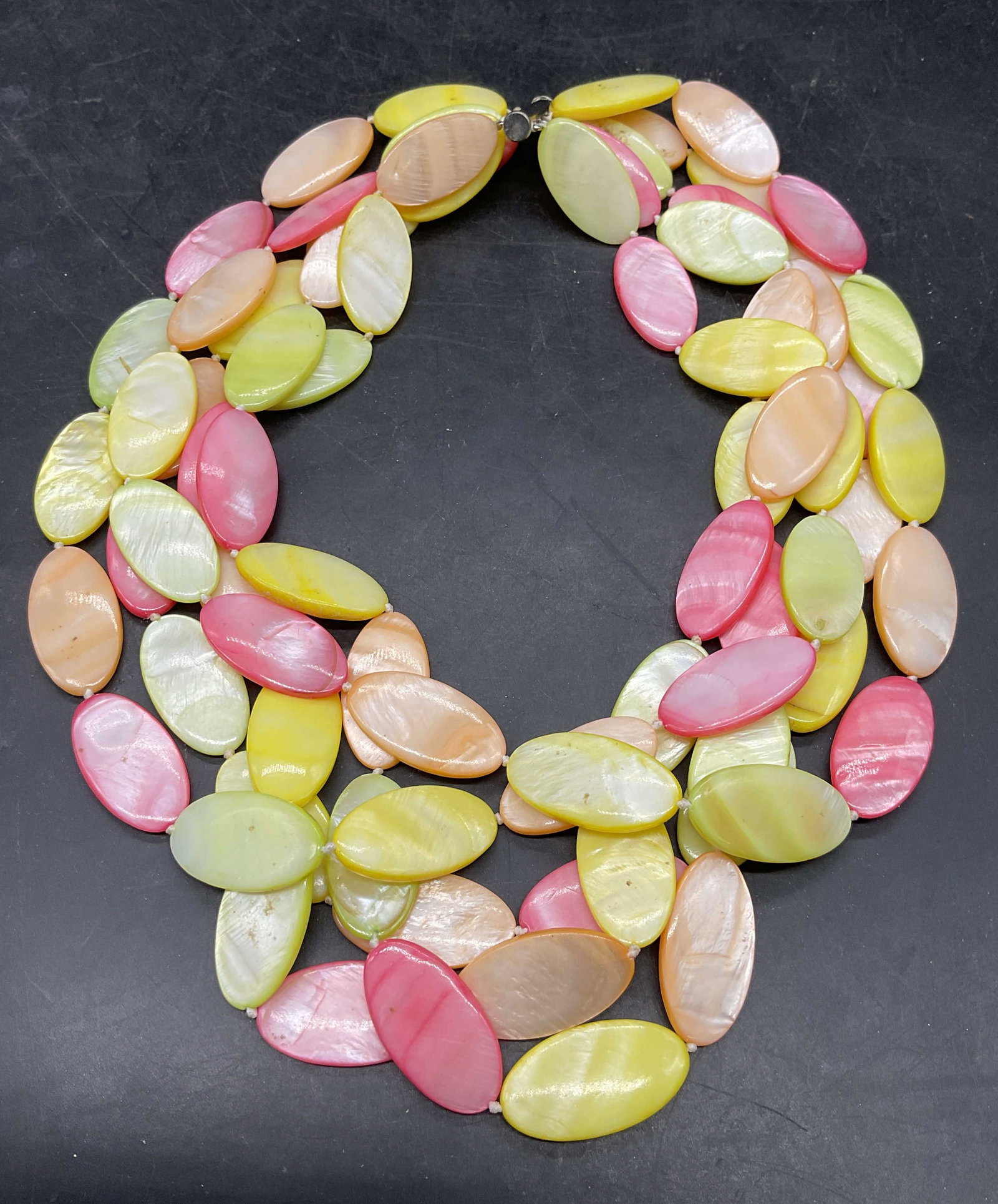 Vintage Chunky Yellow Red MOP Necklace: Vintage dyed mother of pearl multi strand necklace in red, yellow, green, and orange. Drop length 7.5 inches. Some scratching. Jewelry, estate jewelry, costume jewelry, cocktail jewelry, fashion jewel