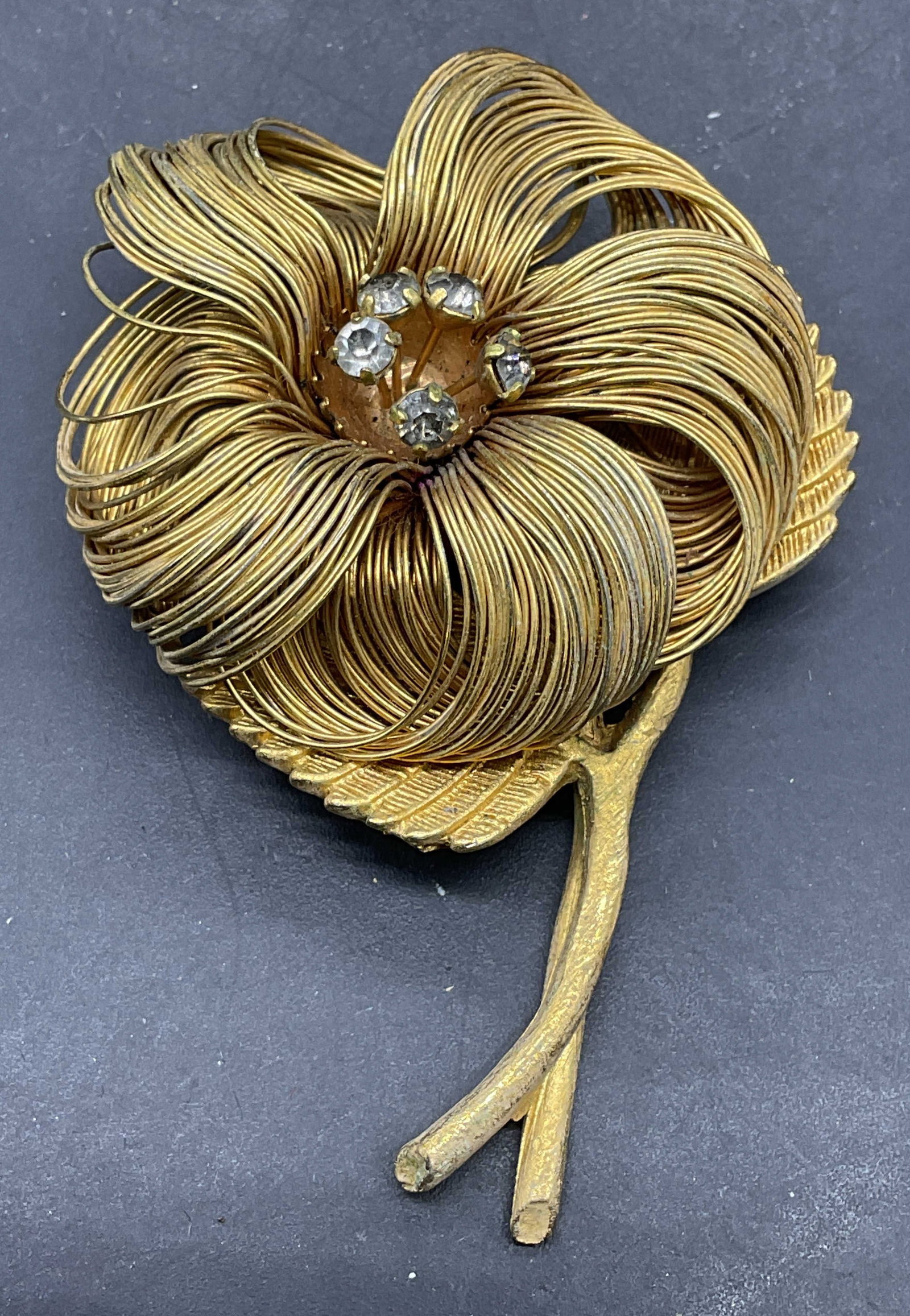 Vintage Gold Tone Wire Crystal Flower Brooch: Vintage gold tone wire flower brooch with crystals. Measures approx. 2.4 x 1.75 inches. Some scratching. Jewelry, estate jewelry, costume jewelry, cocktail jewelry, fashion jewelry, accessories, fashi