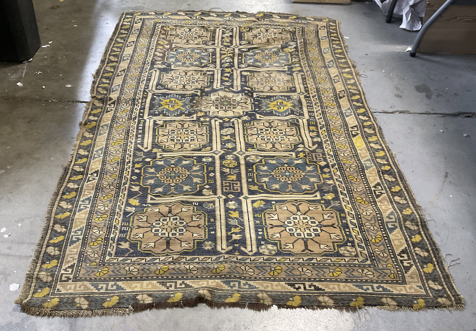 VTG Wool 71in Shirvan-Style Geom Medallion Rug: Vintage Wool Shirvan-Style Geometric Medallion Rug. In The Style of Shirvan Rugs from the Caucasus Region. Medallions in Center with Various Geometric Patterned Borders. Blue, Yellow, and Brown. Some