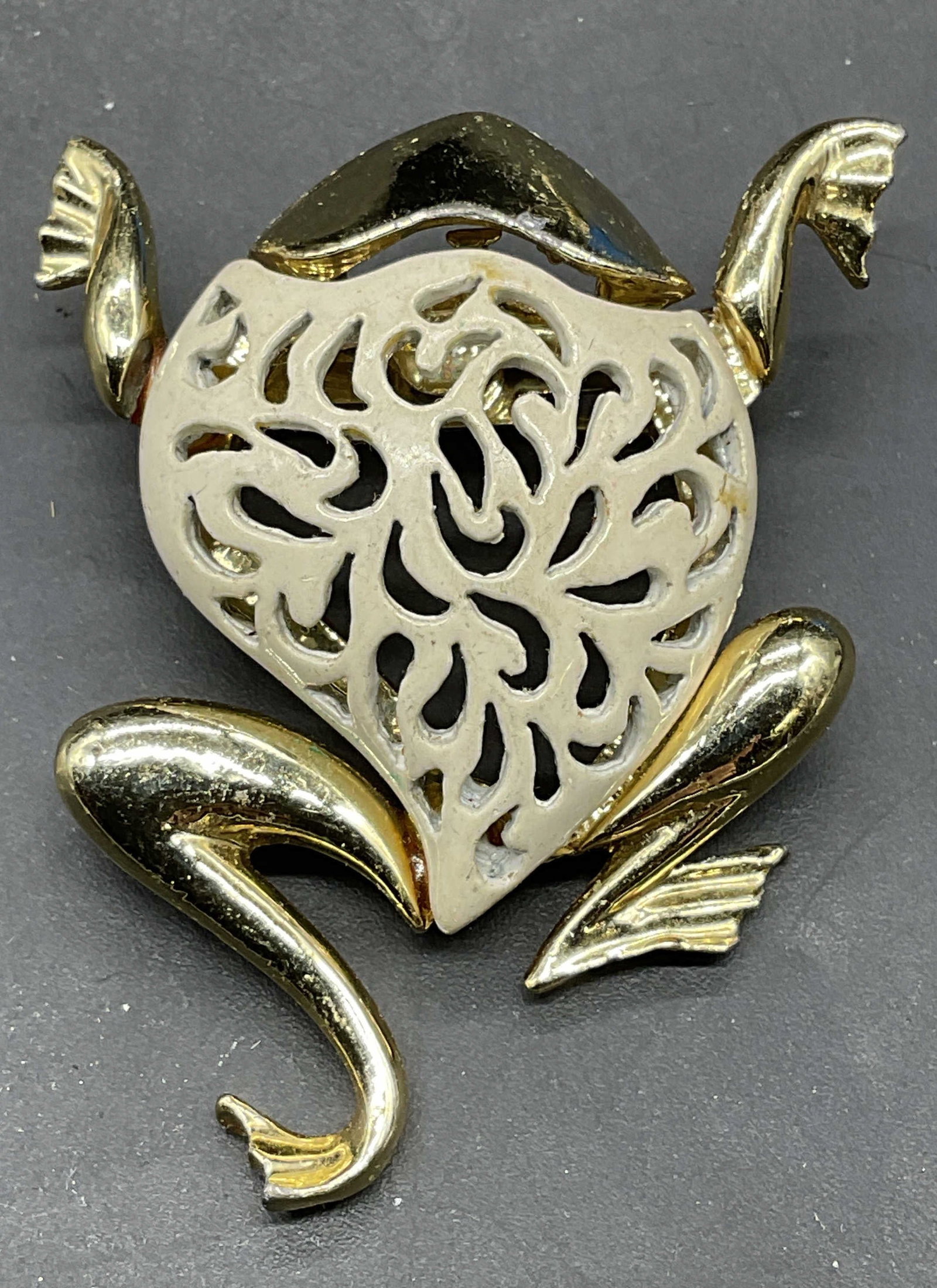 Vintage Gold Tone White Enamel Frog Brooch: Vintage gold tone white enameled frog brooch. Measures approx. 2 x 1.5 inches. Some scratching. Jewelry, estate jewelry, costume jewelry, cocktail jewelry, fashion jewelry, accessories, fashion access