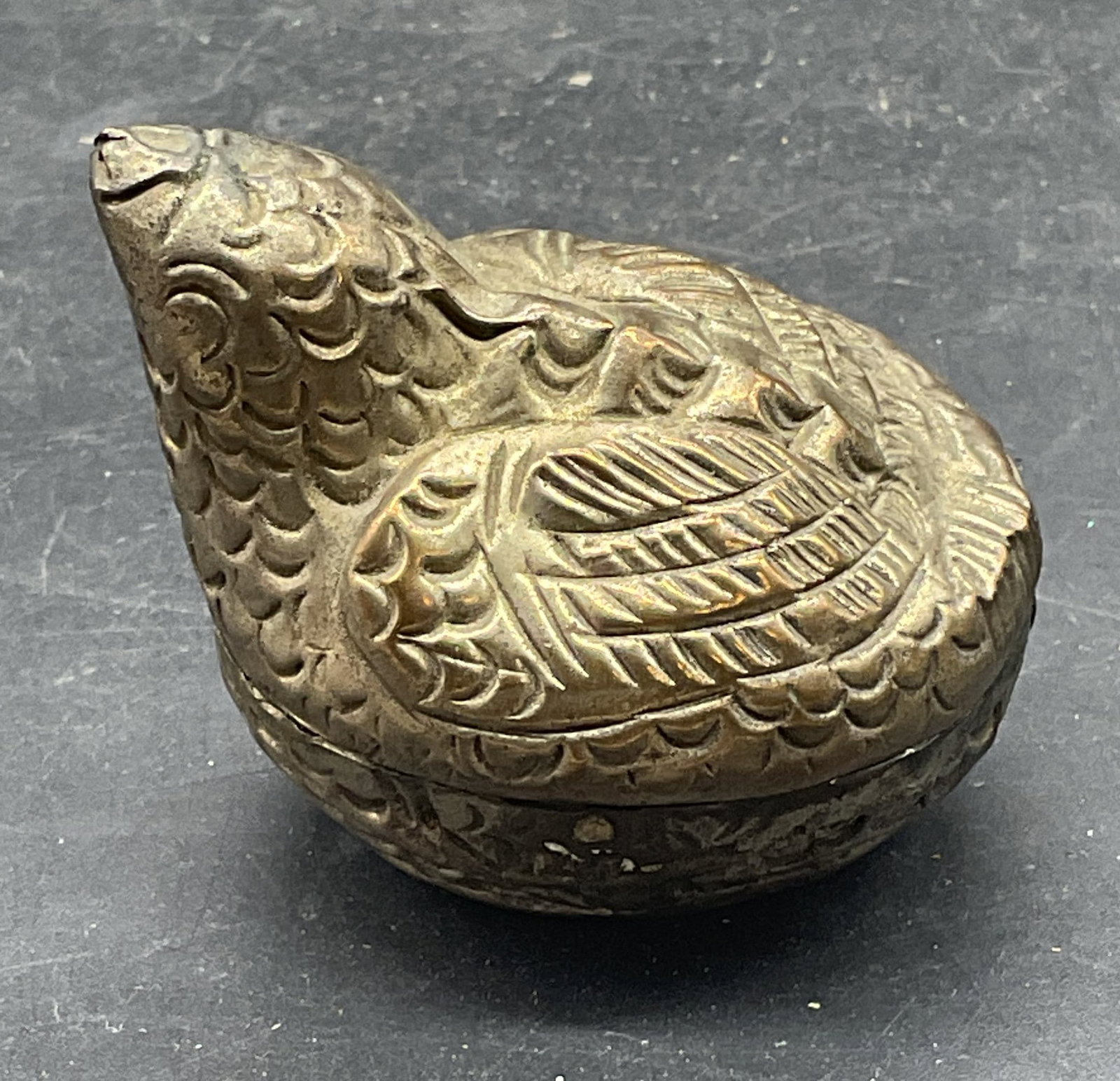 Silver Tone Repousse Chicken Bird Trinket Box: Silver tone repousse chicken/bird motif trinket box. Measures approx. 1.5 x 1.5 x 1.5 inches. Patina, scratching, and warping. Chicken trinket box, bird trinket box, home decor, table decor, 10 s