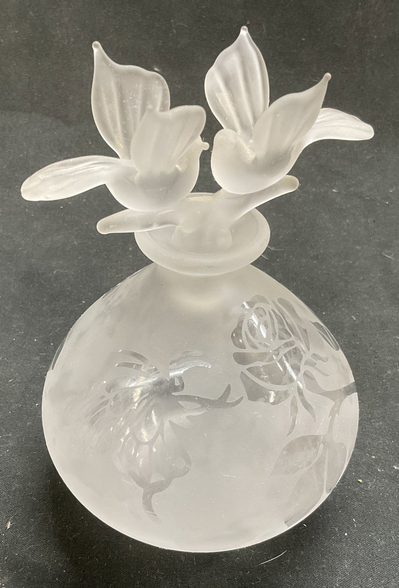 VINTAGE Frosted Glass Bird Topper Perfume Bottle: Vintage Frosted Glass Bird Topper Perfume Bottle. Etched Rose and Butterfly Design. Made in Taiwan R.O.C. Some Scratching. Measures app 5in H x 1.5in Base. Vintage Perfume Bottle, Frosted Glass, Art G