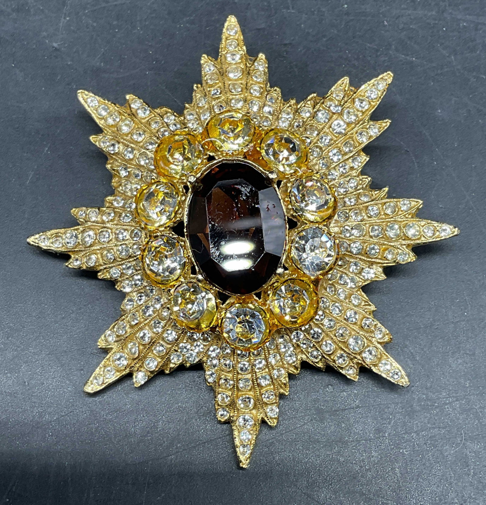 Vintage Todd Anthony Gold Tone Crystal Brooch: Vintage signed Todd Anthony gold tone brooch with crystal decoration. Measures approx. 2.5 inches wide. Some scratching. Jewelry, estate jewelry, costume jewelry, cocktail jewelry, fashion jewelry, ac