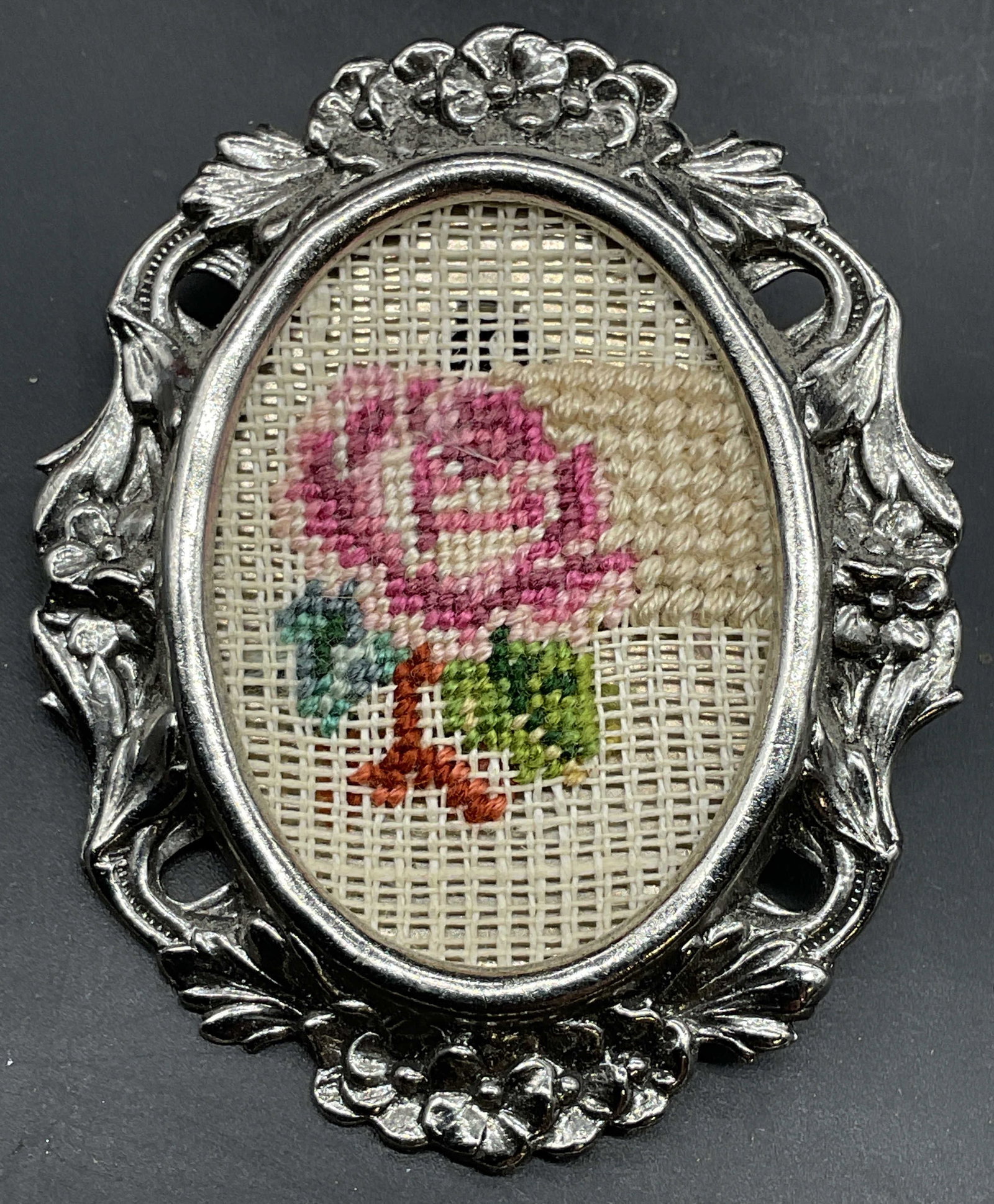 Silver Tone Needlepoint Flower Brooch: Ornate silver tone brooch with needlepoint flower panel. Measures approx. 2.25 x 2 inches. Some scratching. Jewelry, estate jewelry, costume jewelry, cocktail jewelry, fashion jewelry, accessories, fa