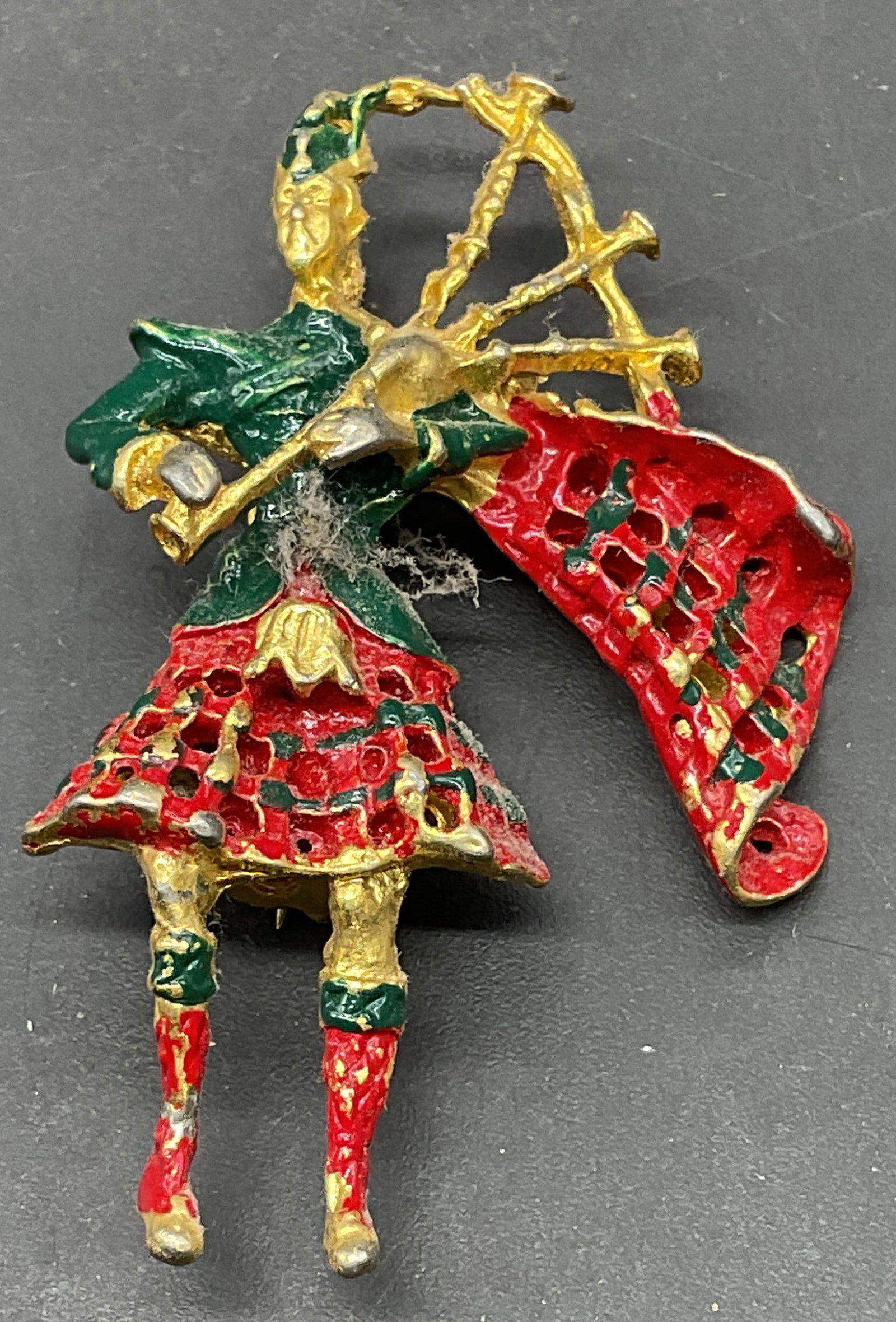 Vintage Gold Tn Bagpipe Player Enamel Brooch: Vintage gold tone bagpipe player enameled brooch. Measures approx. 2 x 1.25 inches. Some scratching. Jewelry, estate jewelry, costume jewelry, cocktail jewelry, fashion jewelry, accessories, fashion a