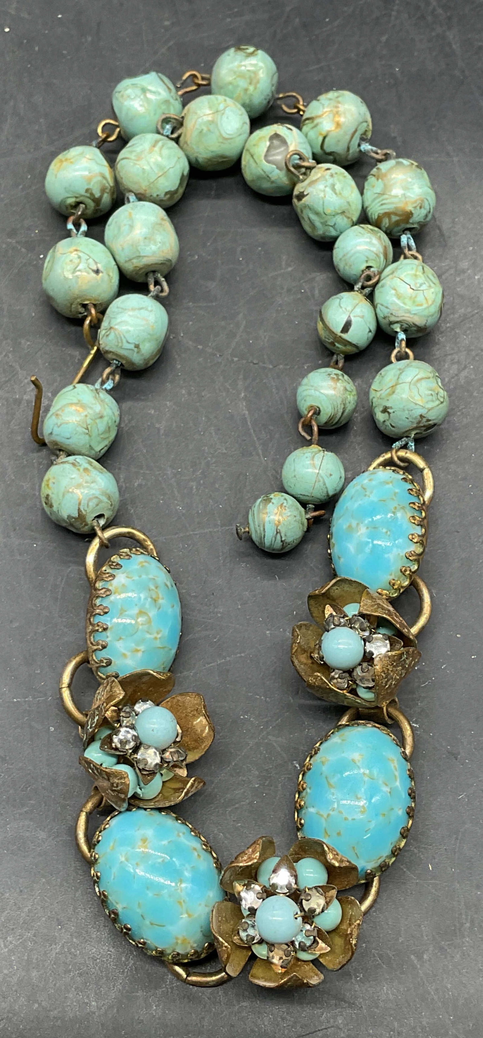 Vintage Faux Turquoise & Crystal Necklace: Vintage faux turquoise beaded necklace with gold tone and crystal, accents. Drop length 7.5 inches. Some scratching. Jewelry, estate jewelry, costume jewelry, cocktail jewelry, fashion jewelry,