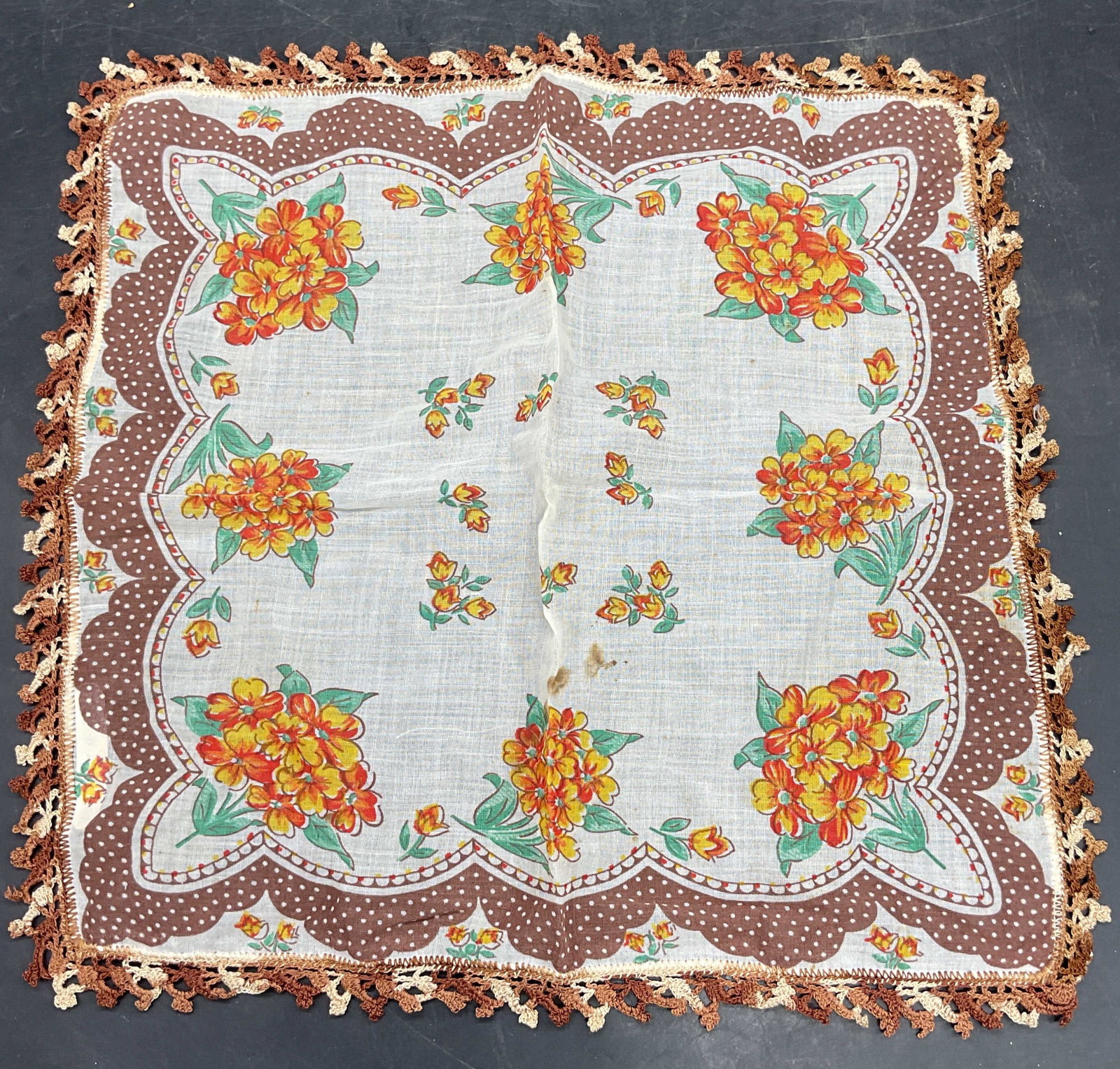Vintage Brown Orange Floral Cotton Handkerchief: Vintage brown, white and orange floral print cotton handkerchief with lace edge. Measures approx. 12 x 12 inches. Labeled Ellen M Thompson on reverse. Some blemishes. Handkerchief, vintage