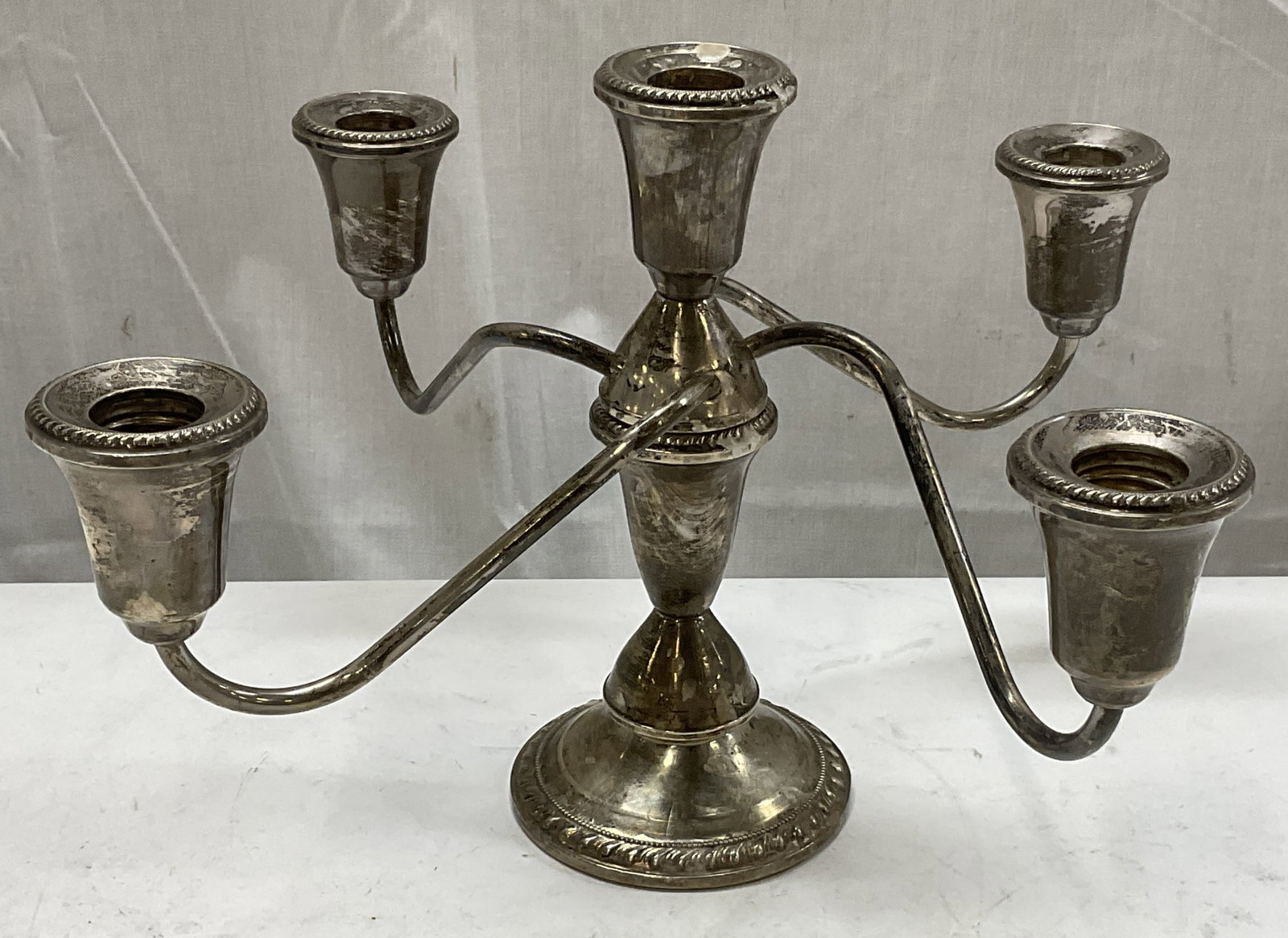 VTG Duchin Creation Weighted Sterling Candelabra: Vintage Duchin Creation Weighted Sterling 5-Light Candelabra. Scratching, Tarnishing, and Wax Residue Present. Measures app 8in H x 12.5in W. Total Weight 882.5 g. Weight Includes Non Sterling