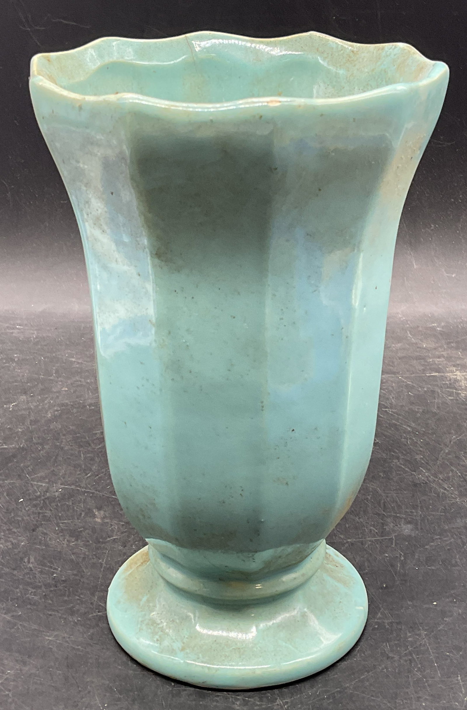 Vintage McCoy Blue Pottery Vase USA: Vintage McCoy turquoise blue pottery vase. Footed base with fluted scalloped rim. Made in USA. Measures approx. 4.75 x 7.25 inches. Wear including hairlines, scratching, small chips. McCoy vase,