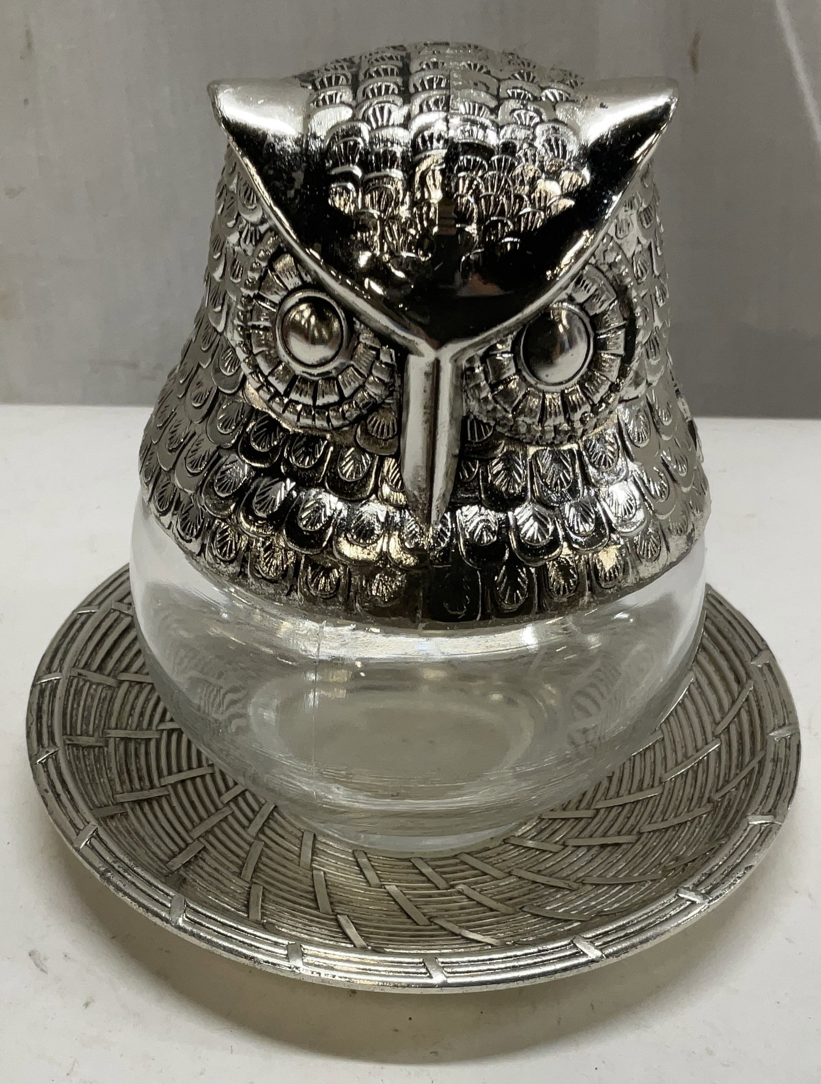 Lt 2 VTG Silver Toned Owl Glass Bottle+: Vintage Silver Toned Metal Owl Glass Bottle and Holiday Imports Silver-Plated Dish with Basket Weave Design Made in Japan. Condition Consistent with Exposure. Measures app 4in H x 2.5in Diam. Vintage