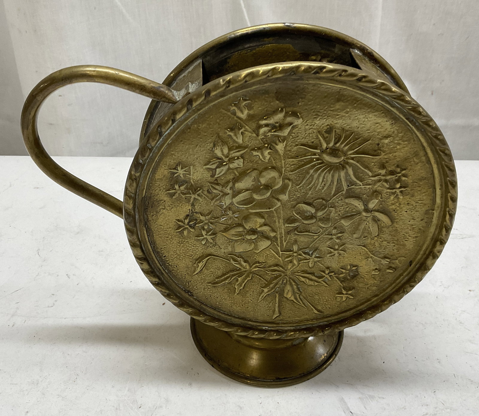 Vintage Embossed Floral Brass Vessel: Vintage Embossed Floral Brass Vessel. Tarnishing Present. Residue Inside. Measures app 6.75in H x 2in W. Vintage Vessels, Vintage Brass, Embossed, Floral Pattern, Pitchers, Vases, Home Decor 8 CS