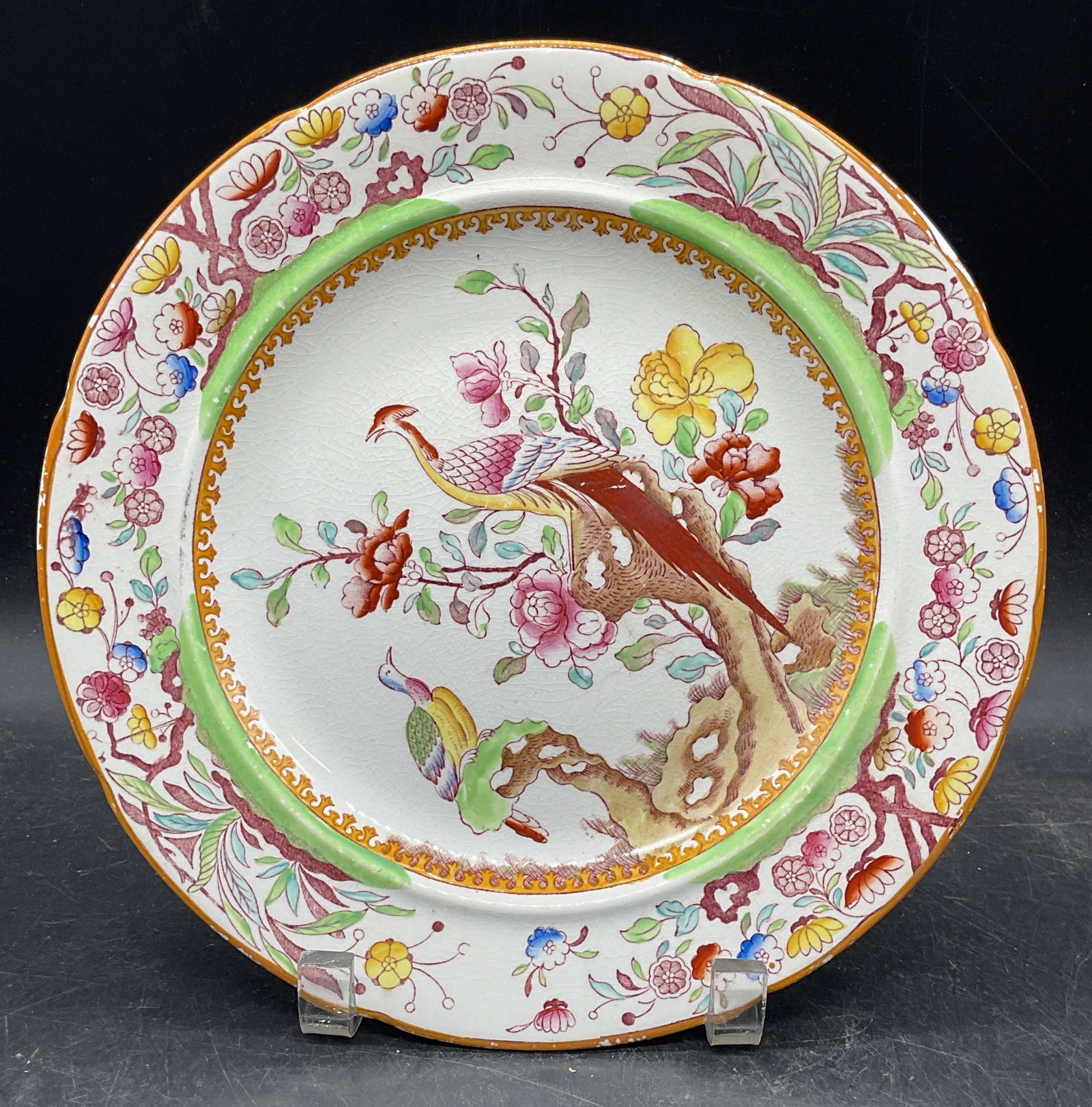 Antique Masons Ironstone Pheasant Plate: Antique Masons ironstone China plate. Chinoiserie pheasant design. Hand painted. Made in England. Measures approx. 9.5 inches wide. Wear including scratching, crazing, hairline, chips, loss to paint. 
