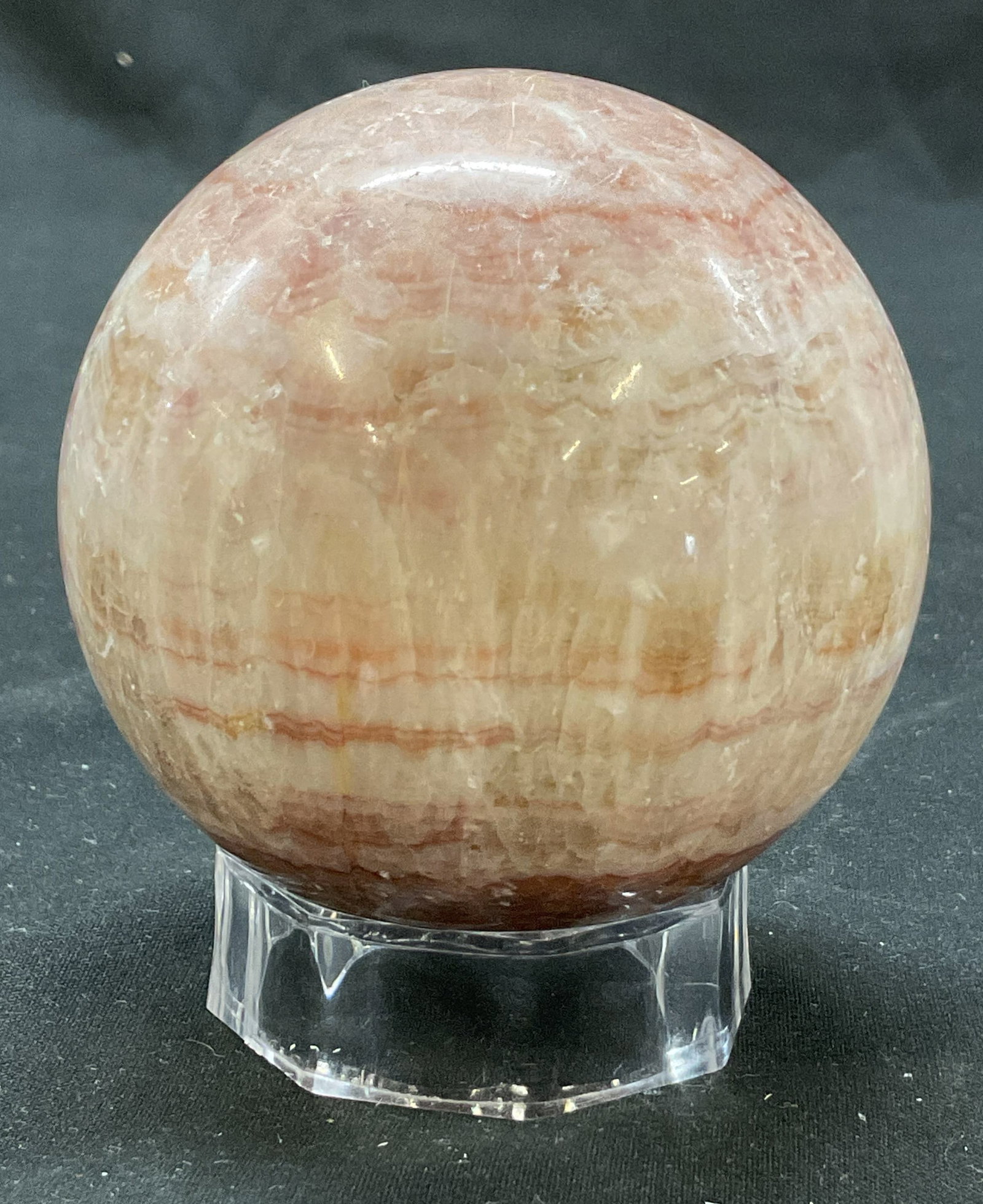 Vintage Marble Sphere W Clear Stand: Vintage marble sphere. Sphere shape with varying colors. Comes with clear stand. Measures ht approx 3.5 inches diam approx 3 inches. Some scratching. Marble sphere, paperweight, home decor, table deco