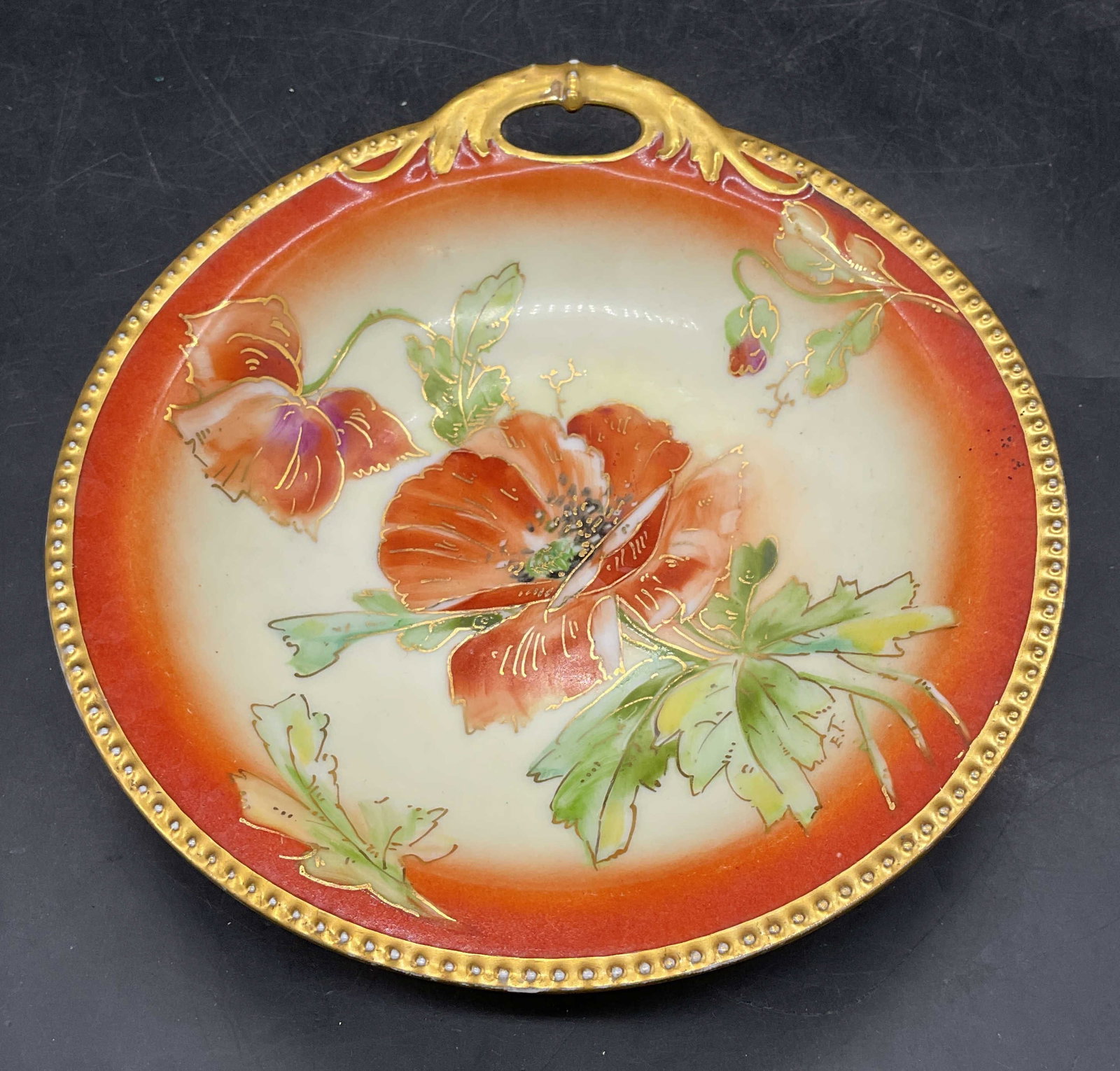 Antique Haviland D Arcys Floral Porc Dish, France: Antique Haviland porcelain dish. Made in France. Marked D Arcys. Hand painted floral design in orange with gilt decoration. Measures approx. 7 x 6.5 x 1.25 inches. Some scratching and loss to paint, s